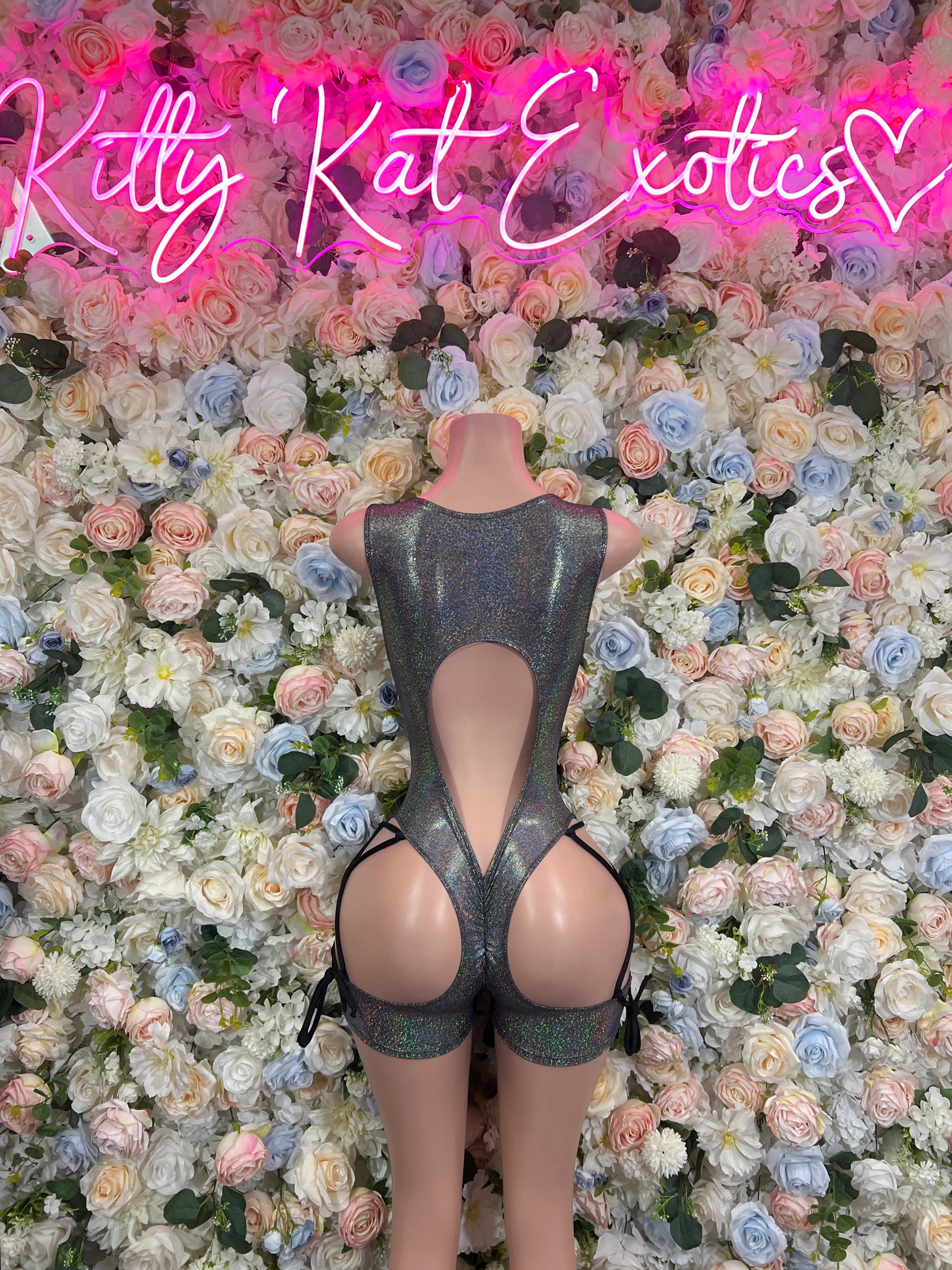 Chrome metallic bodysuit with X-back straps and open back cutout