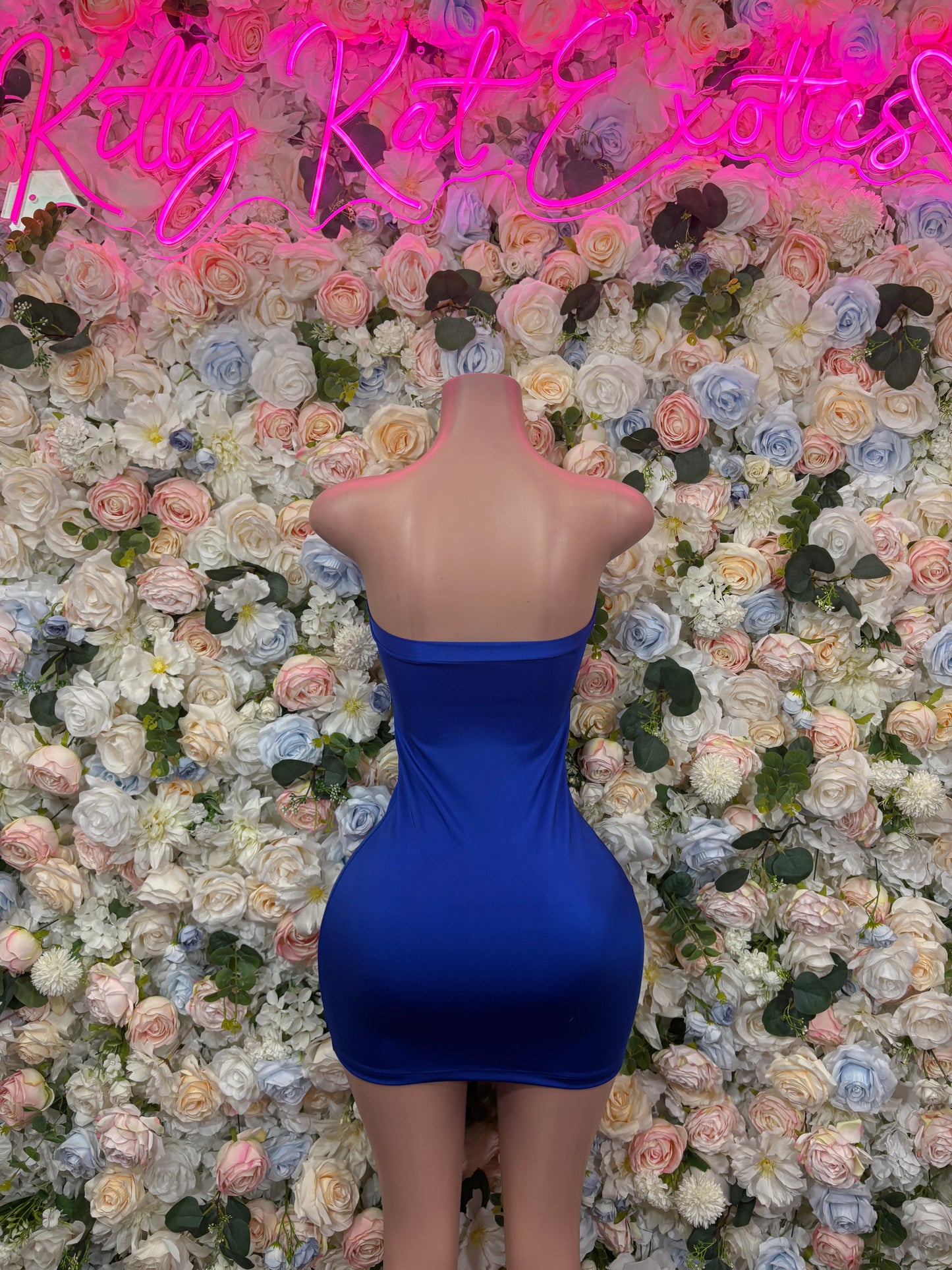 Blue backless mini dress with thin straps and cutout back