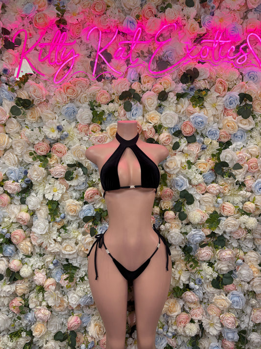 Black halter bikini top with keyhole cutout and tie-side thong bottom