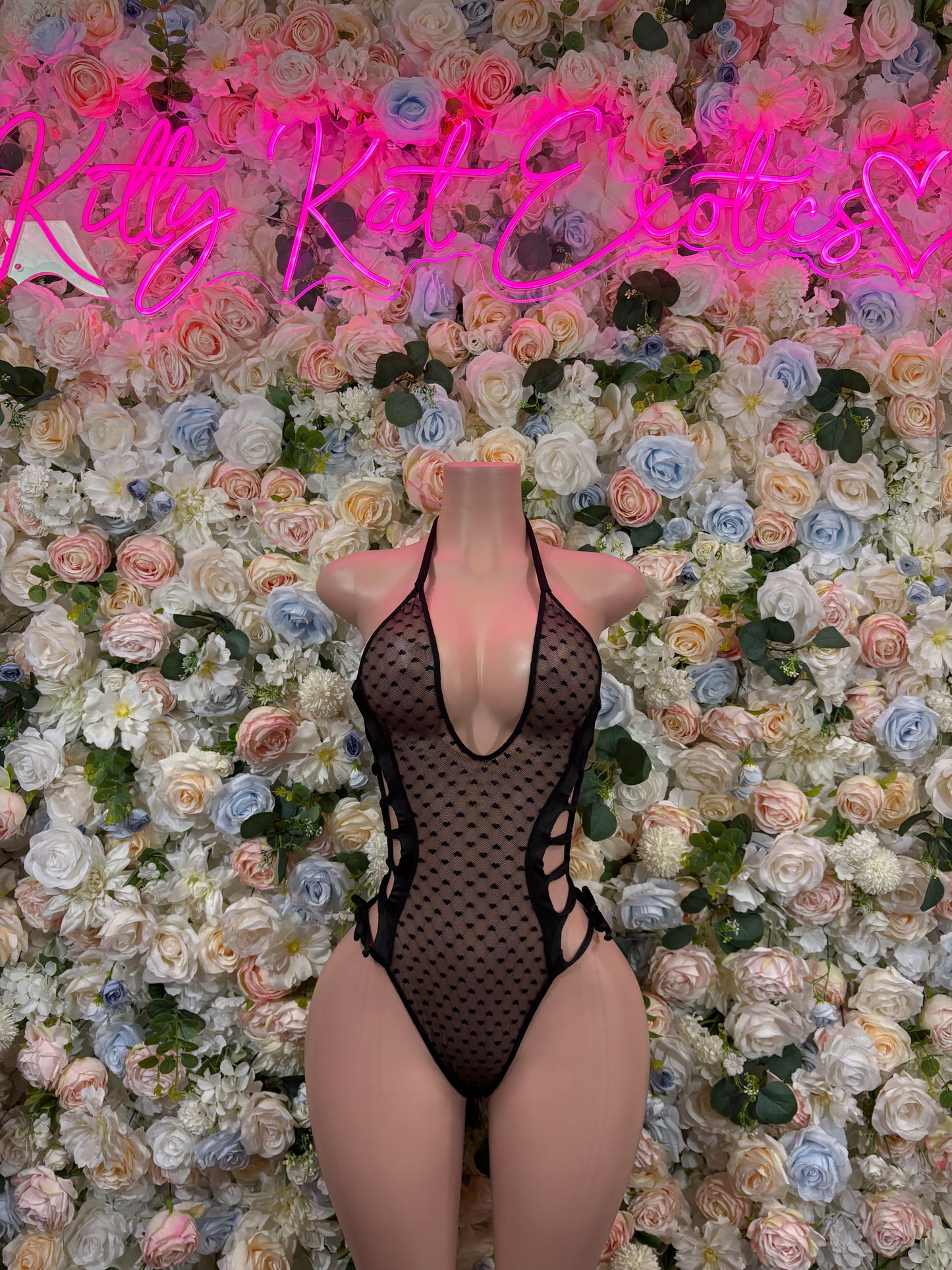 Black mesh heart bodysuit with cutout front and long sleeves