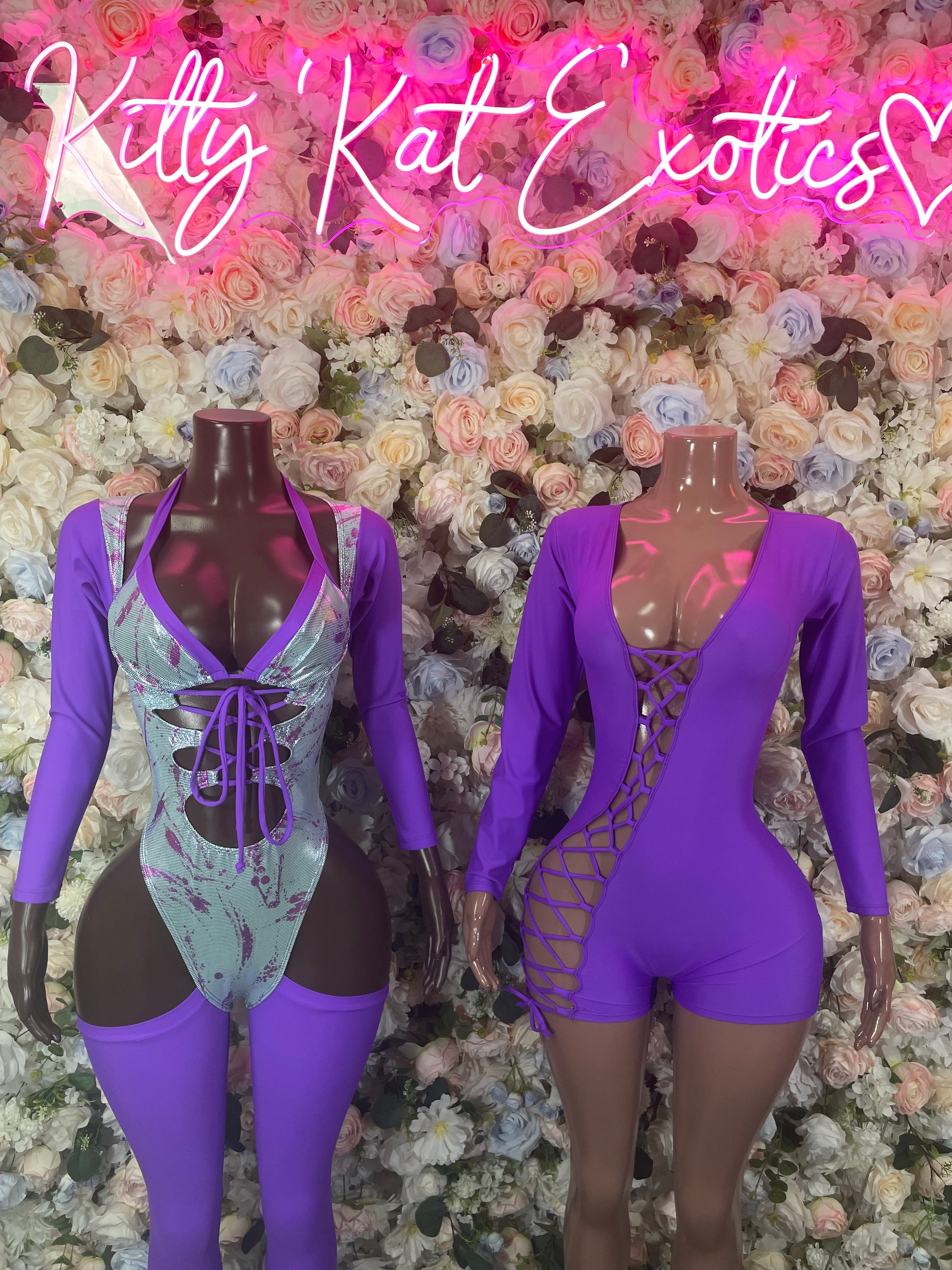 Purple long-sleeve bodysuit with lace-up front and V-neck cutout
