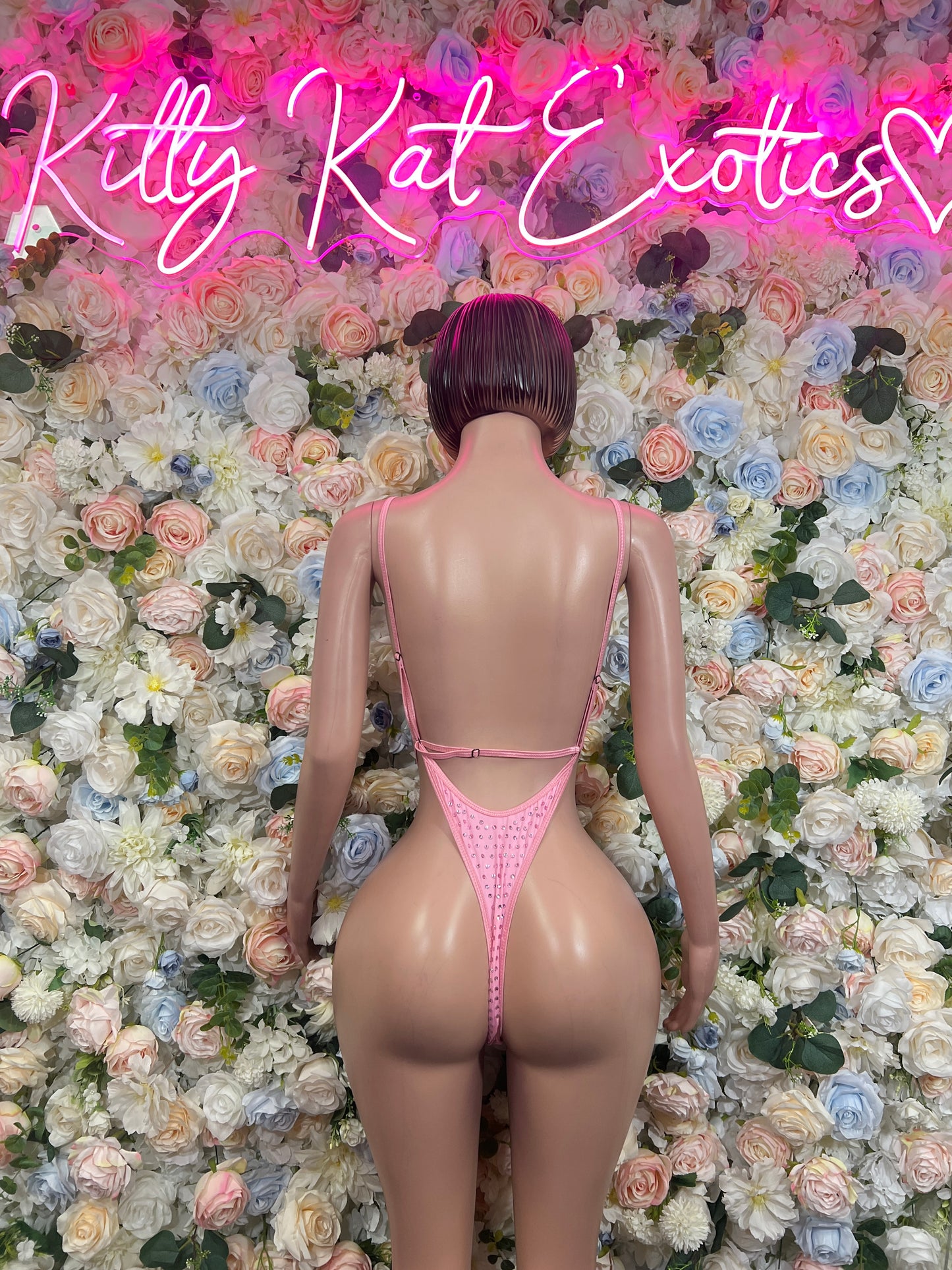 Pink rhinestone bodysuit, strappy back with V-shaped back cut
