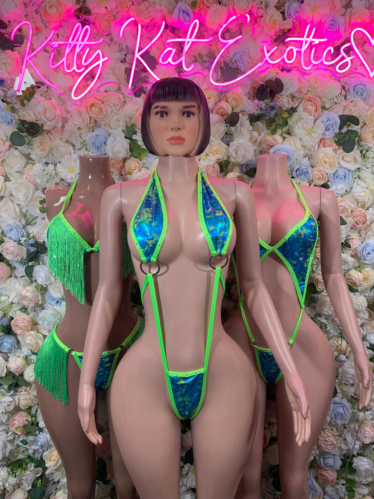Neon green and blue bodysuit with front cutout and fringe tassel details
