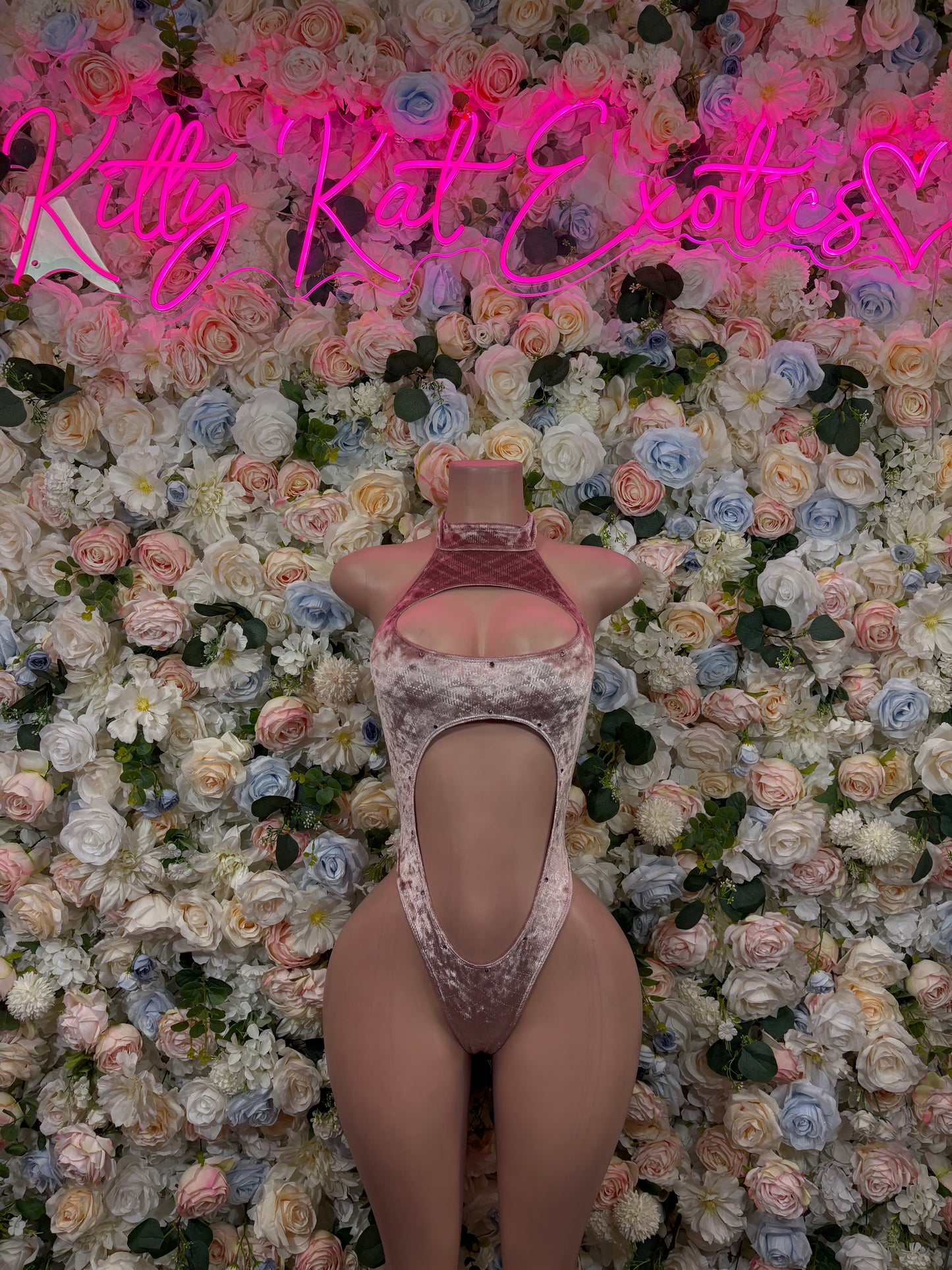 Velvet bodysuit with open back and high-cut legs, pink nude