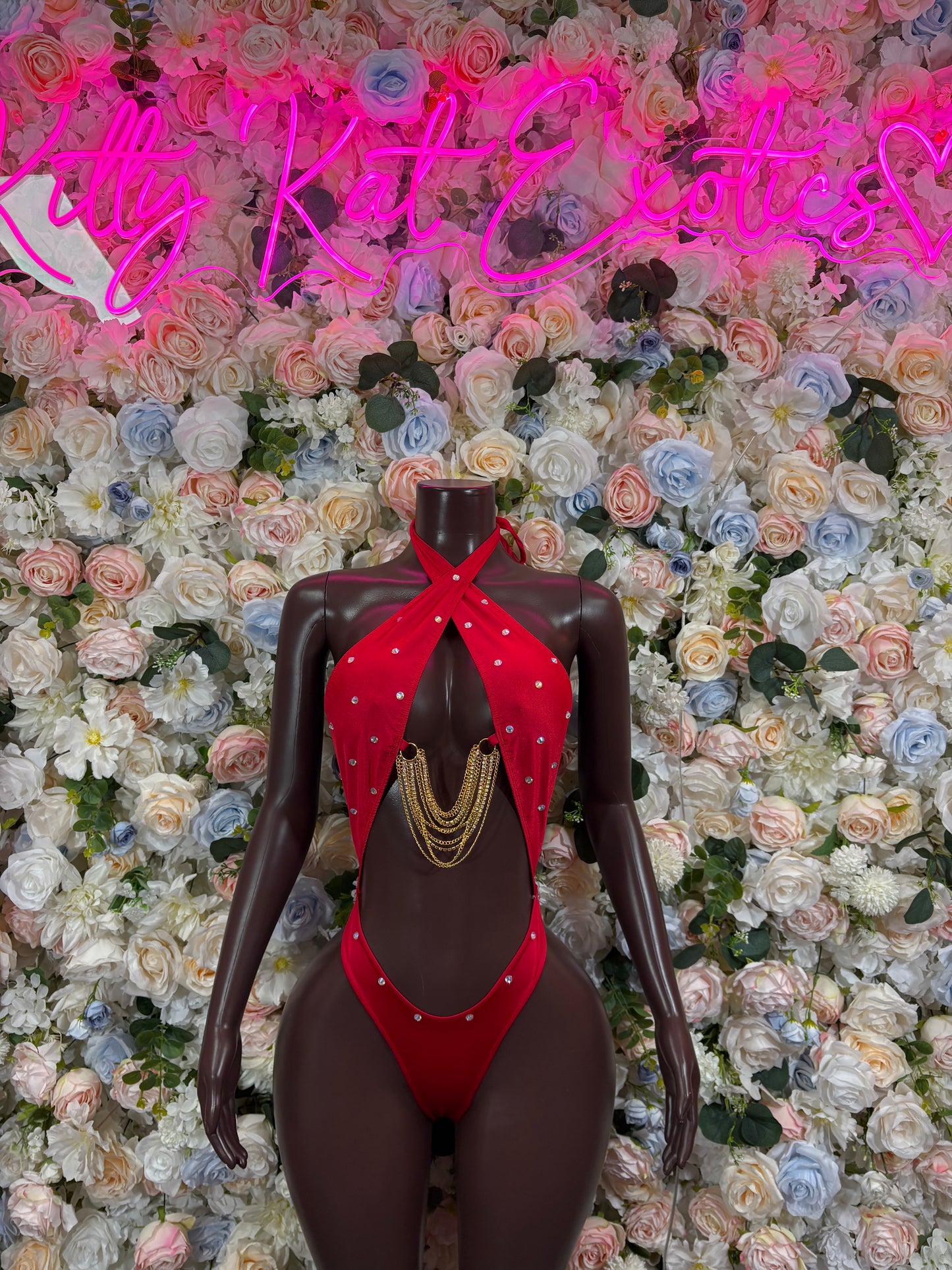 Red rhinestone bodysuit with front cutout and tie detail, sleeveless one-piece