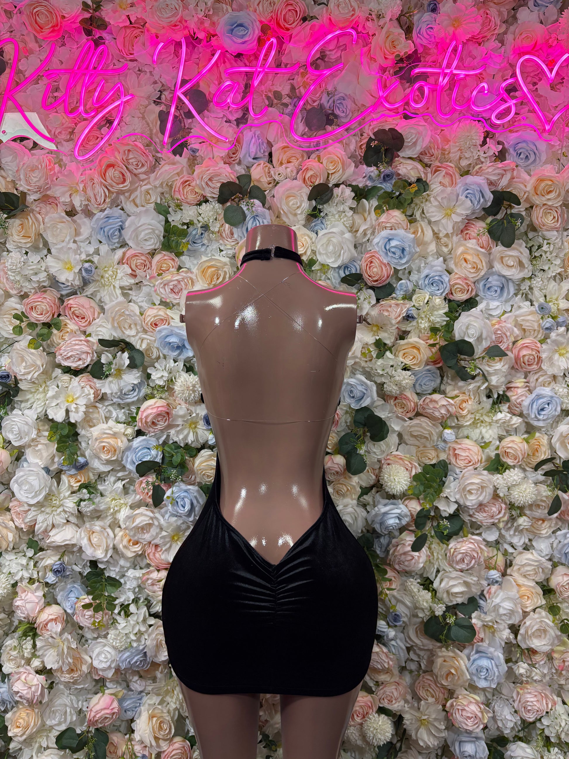 Black one-piece bodysuit with low back and deep V front
