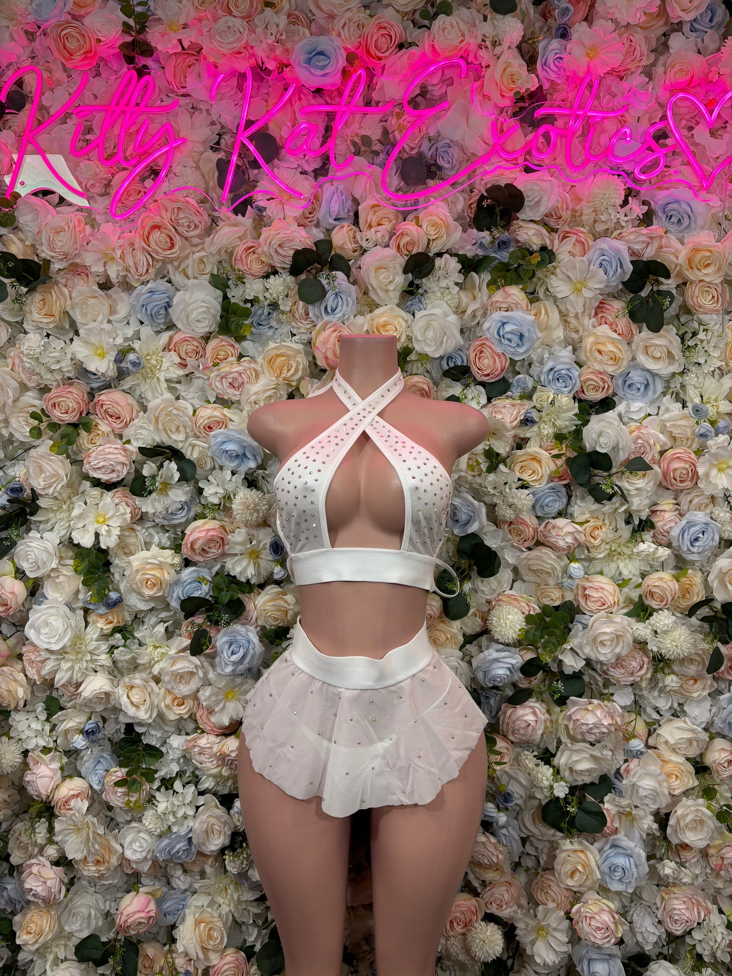 White rhinestone halter crop top with garter straps and sheer ruffle mini skirt set