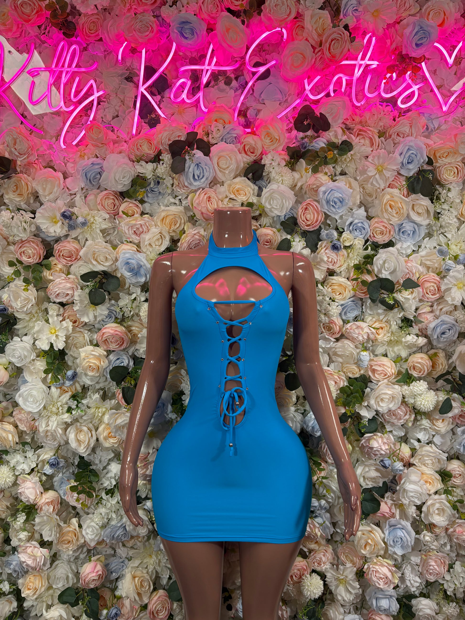 Turquoise halter mini dress with lace-up front and strappy neckline, backless cut
