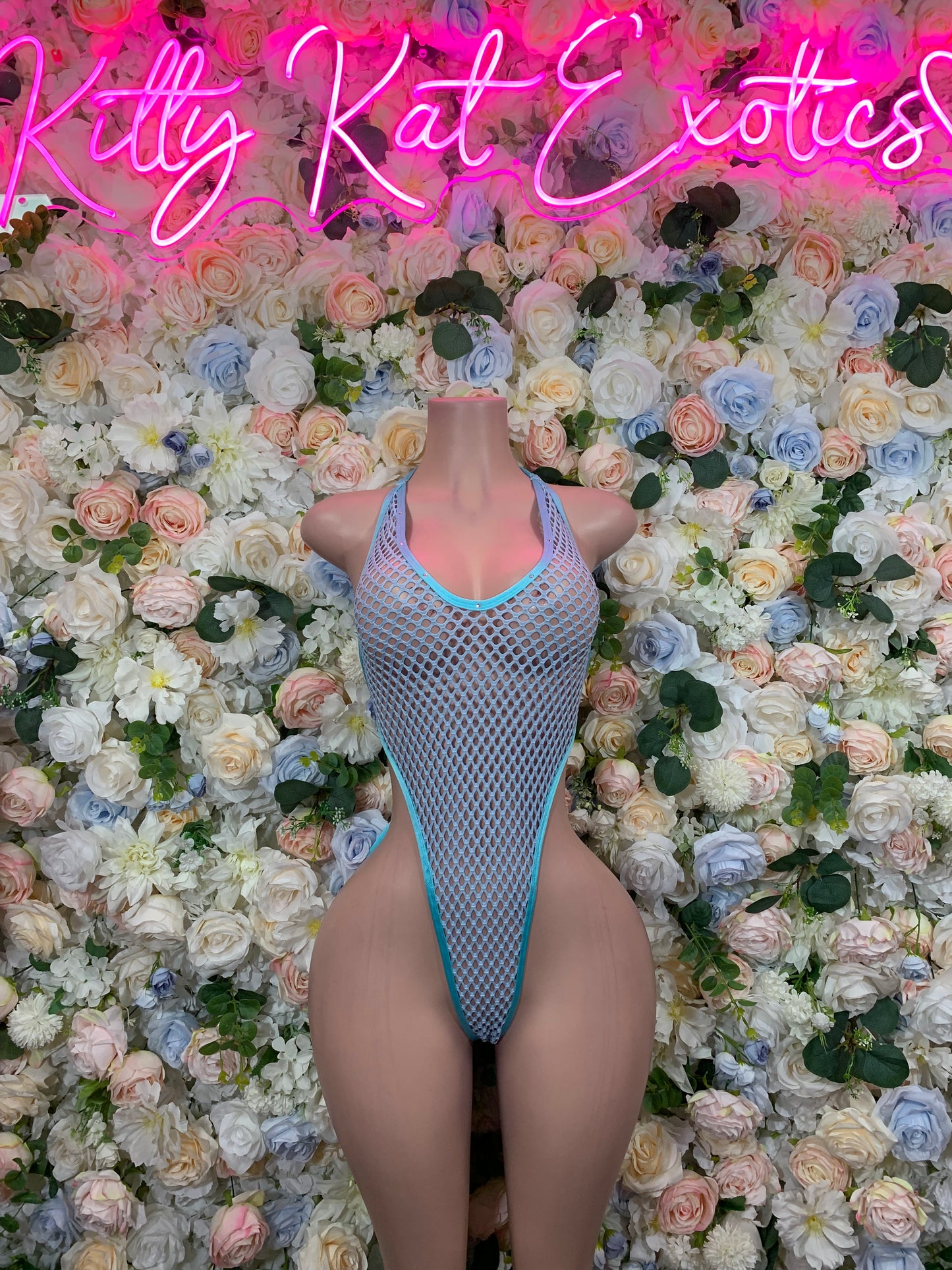 Light blue fishnet one-piece bodysuit with scoop neckline and brief-cut bottom