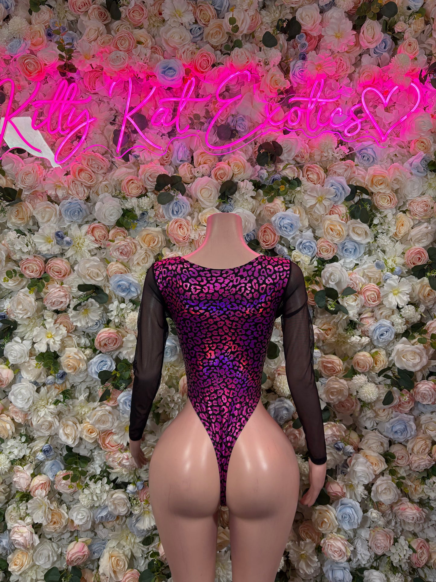 Bottlegirl cheetah-print one-piece bodysuit with mesh sleeves and crisscross cutout