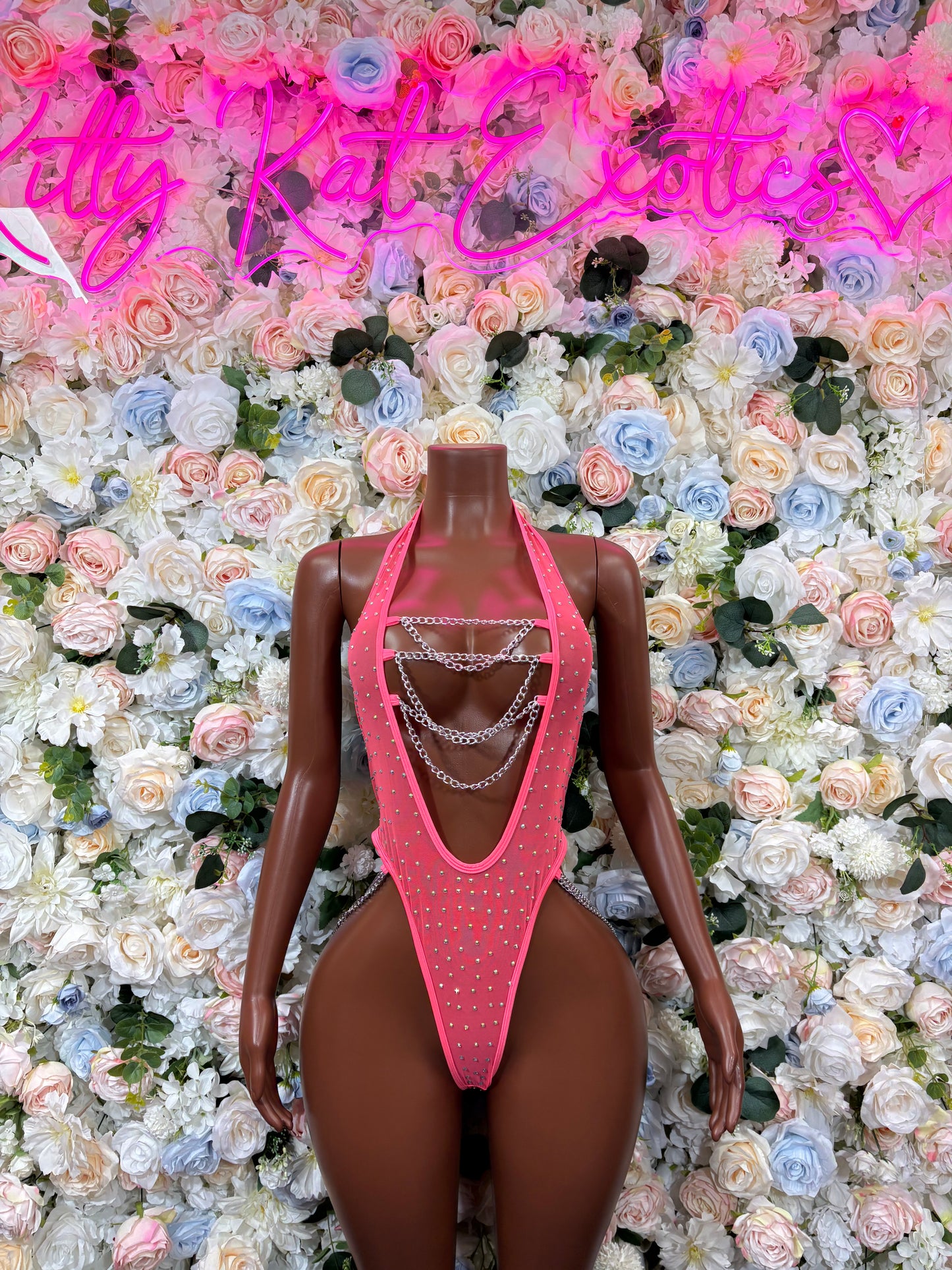 Coral pink rhinestone chain bodysuit with halter straps and thong back