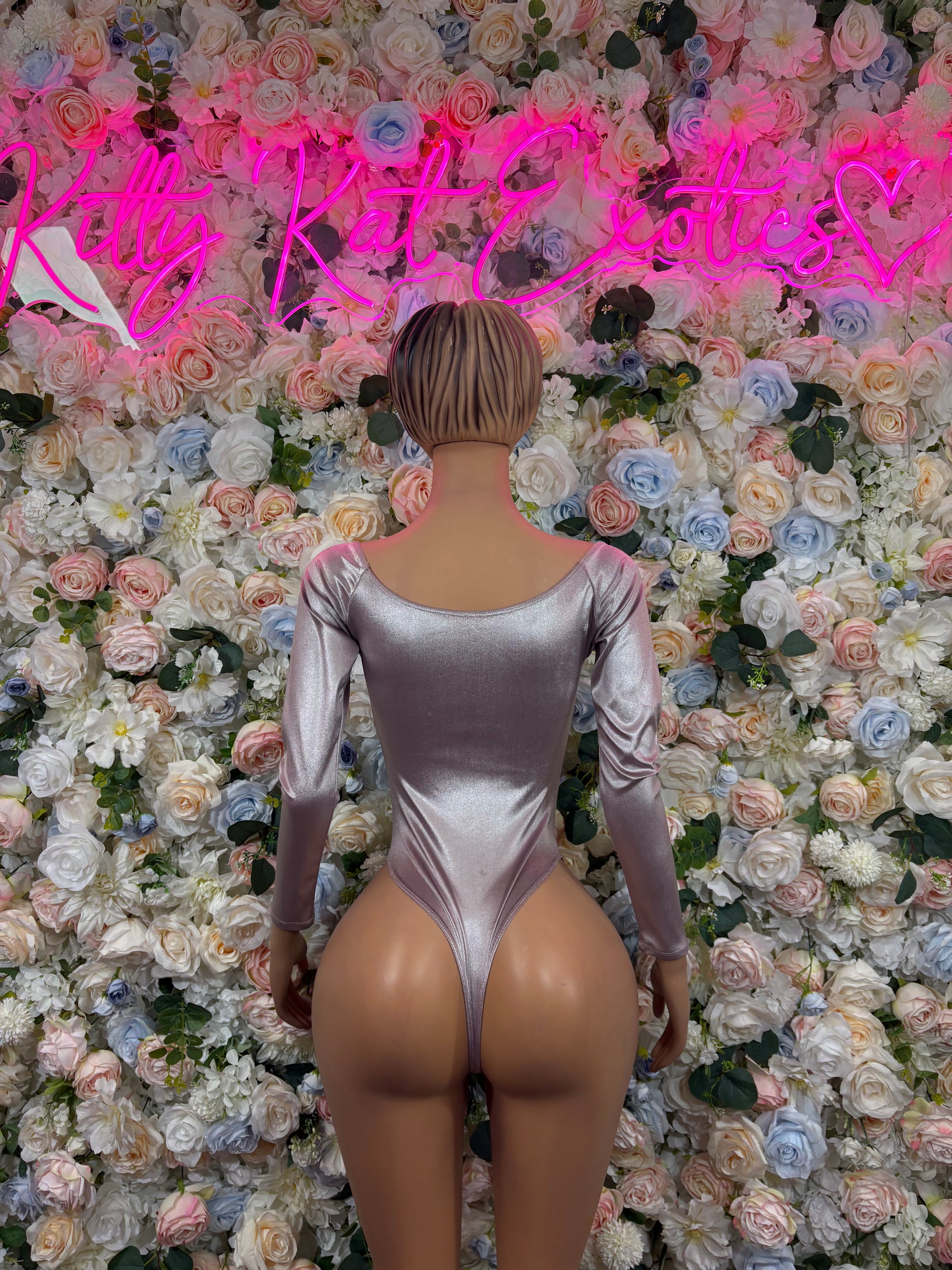 Metallic silver one-piece bodysuit back view with long sleeves