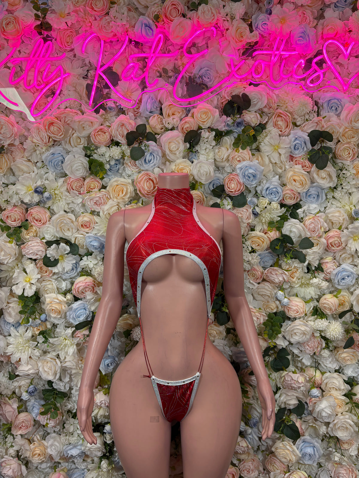 Red metallic slingshot thong bodysuit with halter neckline and back ties