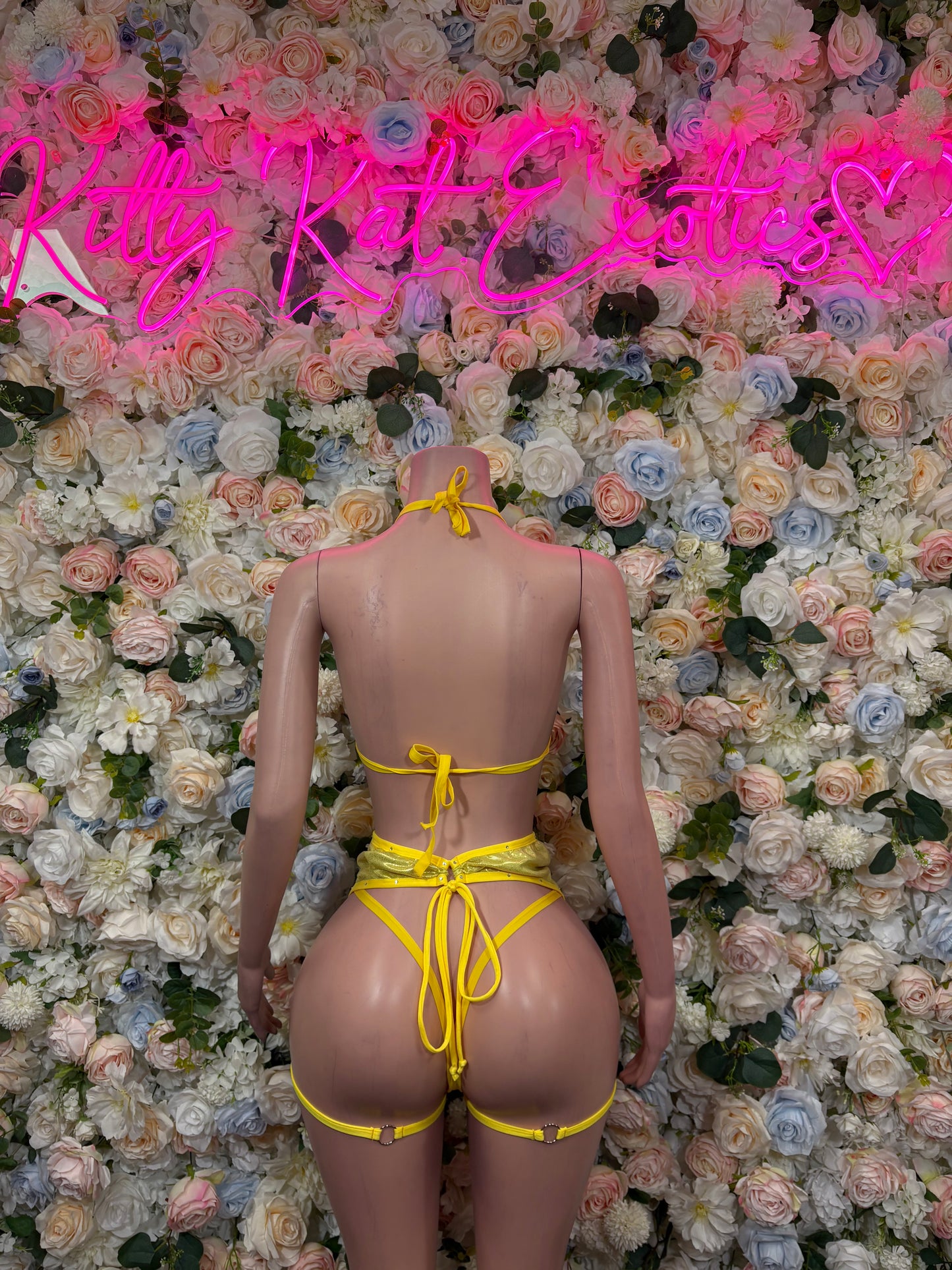 Yellow lingerie set, back view, triangle bra and strappy thong-style bottom