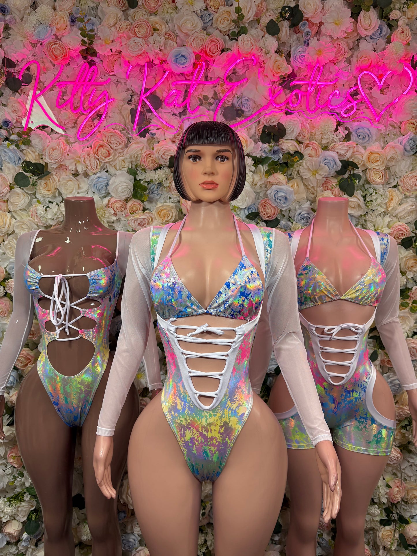 Rainbow holographic dance bodysuit with plunging neckline, lace-up chest, long sleeves