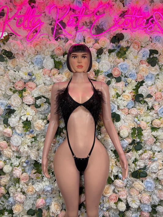 Black strappy bodysuit with feather-fringe cups and deep V front