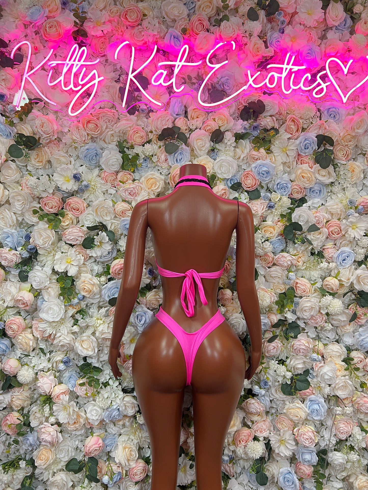 Pink and black fishnet two-piece bikini set, strappy back with tie details