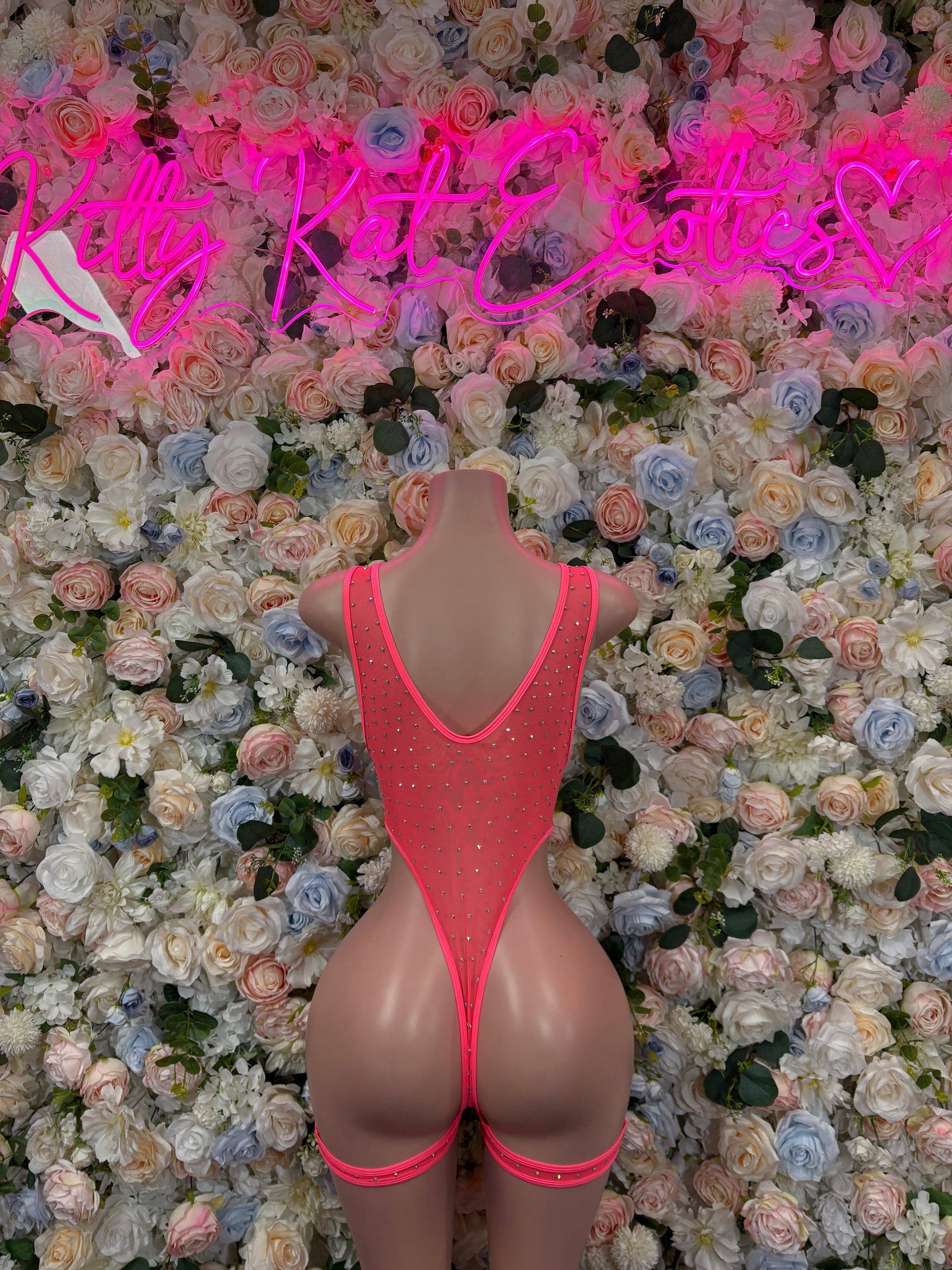 Coral rhinestone bodysuit with V-back and open side straps