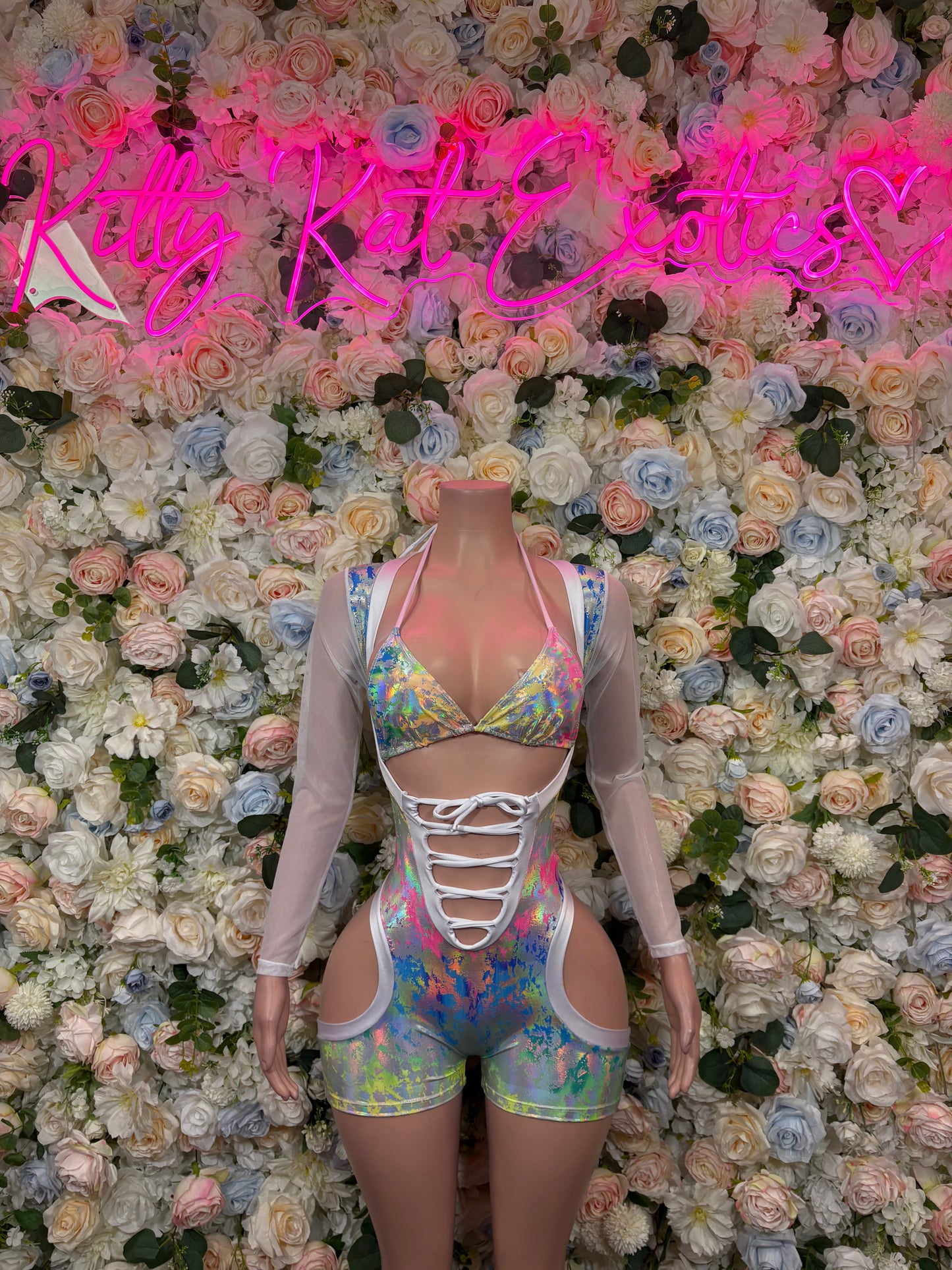 Rainbow holographic dance bodysuit with lace-up front and side cutouts, long sleeves
