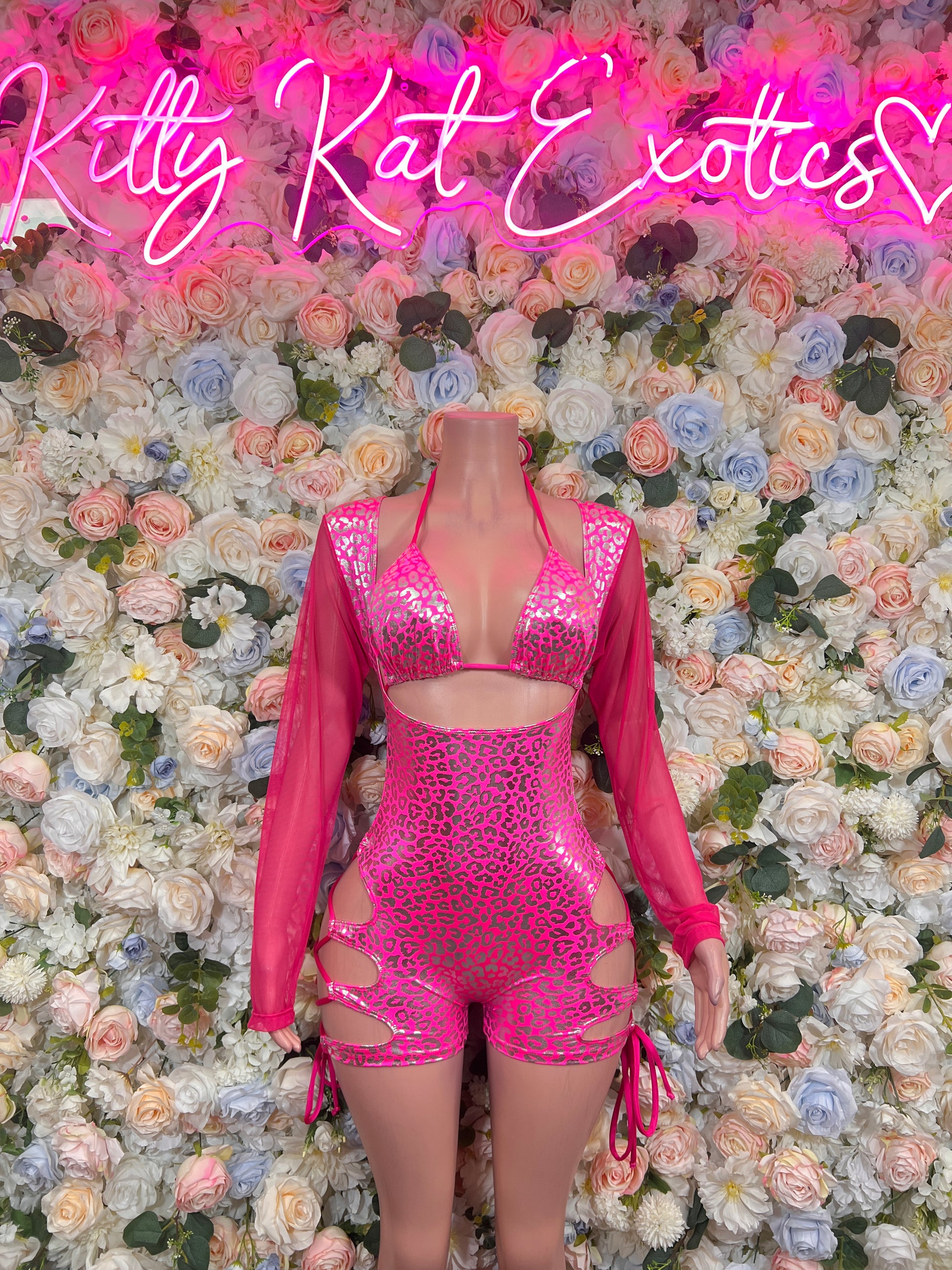 Hot pink metallic cheetah bodysuit with triangle top, shorts, and tie sides