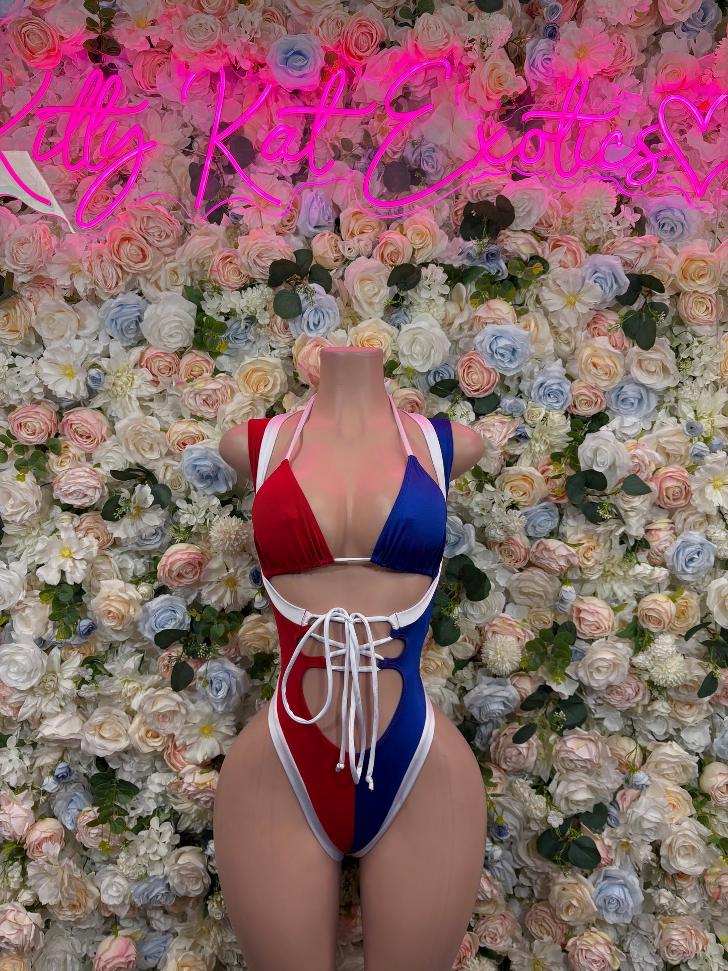 Tricolor sleeveless bodysuit with V neckline and white lace-up front, red/blue/white