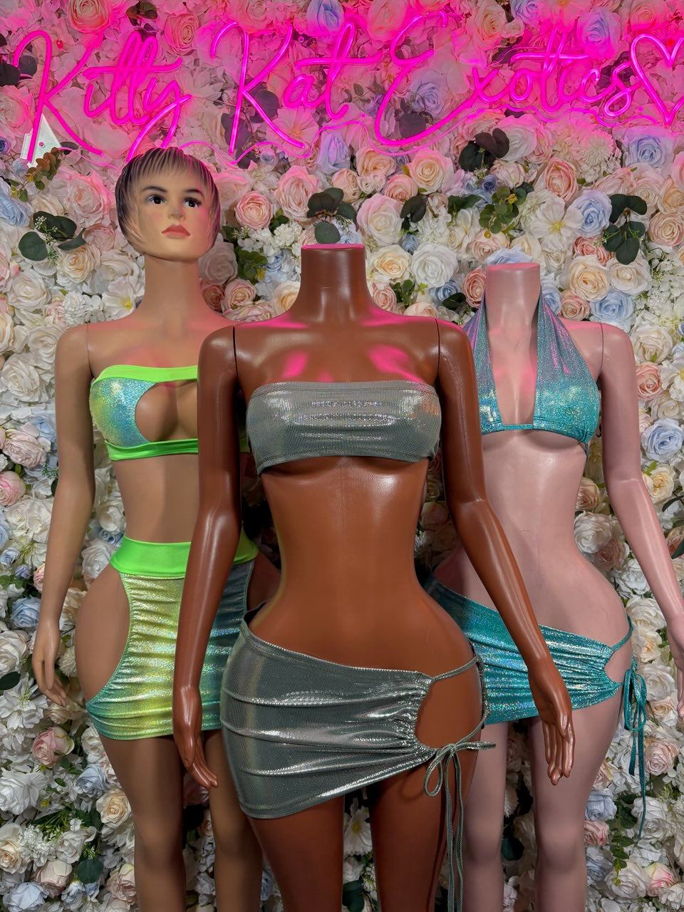 Teal holographic glitter halter crop top with matching mini skirt, front view