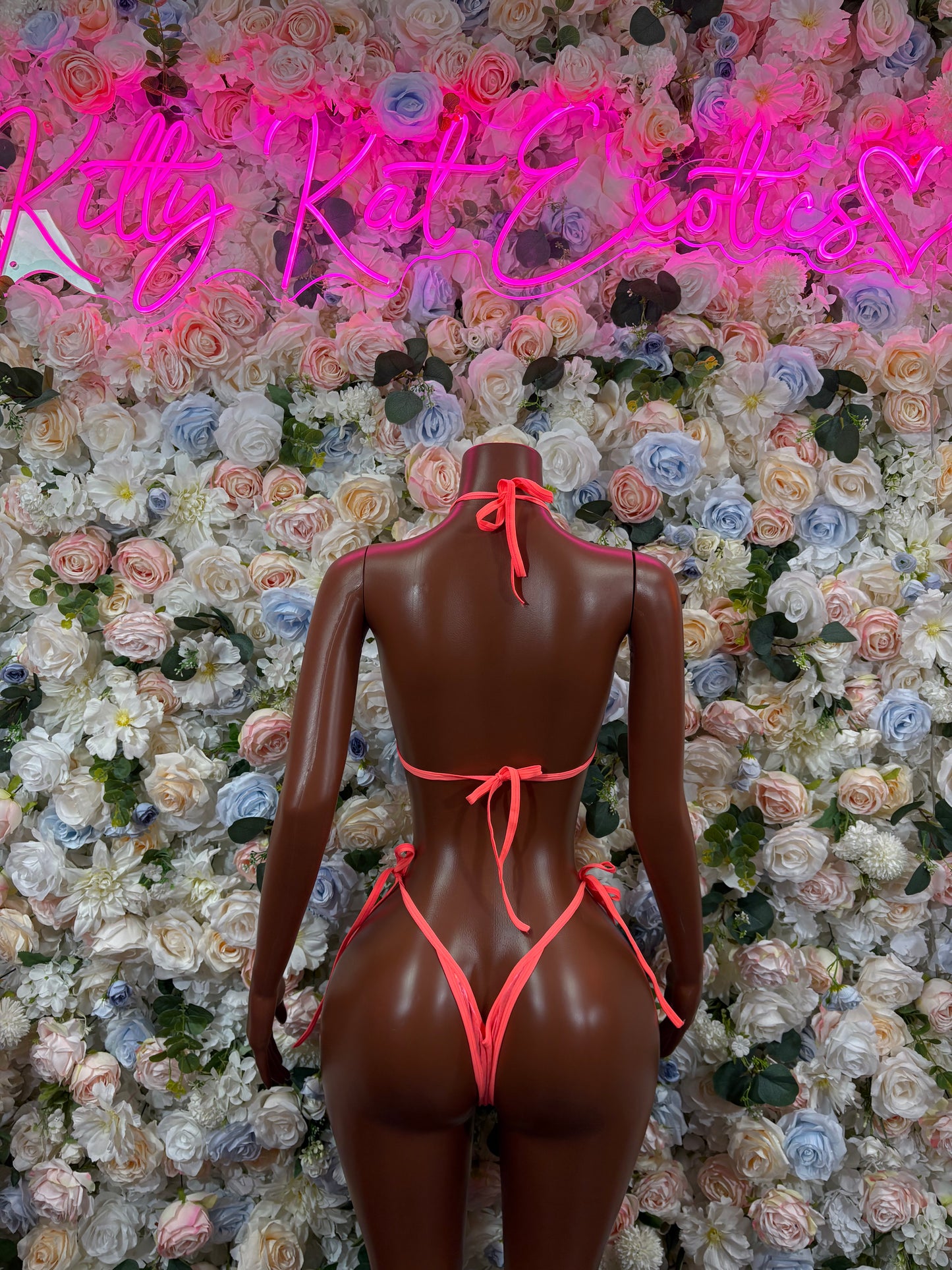 Coral metallic one-piece bodysuit with tie-back straps and low back