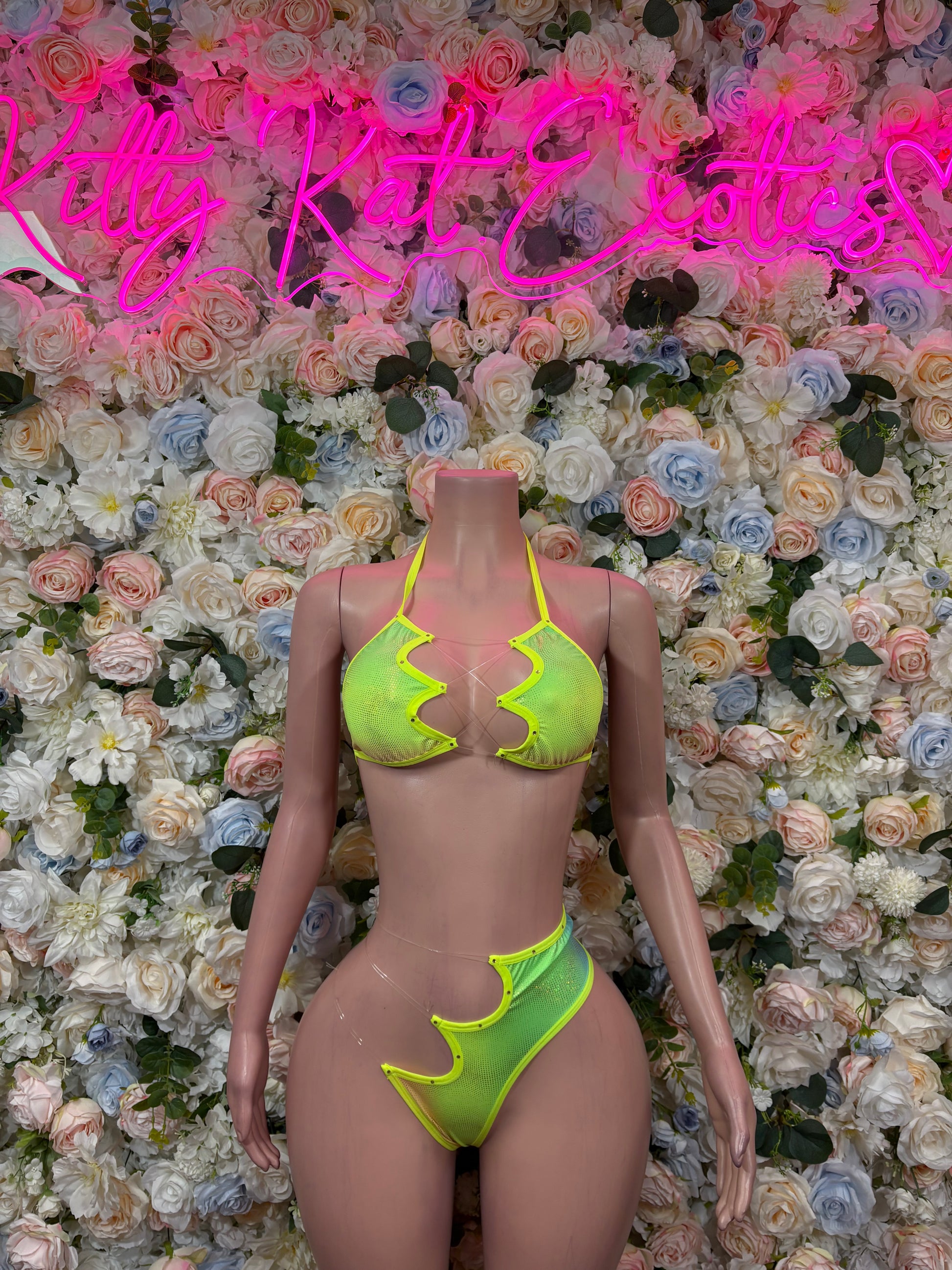 Neon green rave two-piece bikini set with scalloped triangle top and matching bottoms