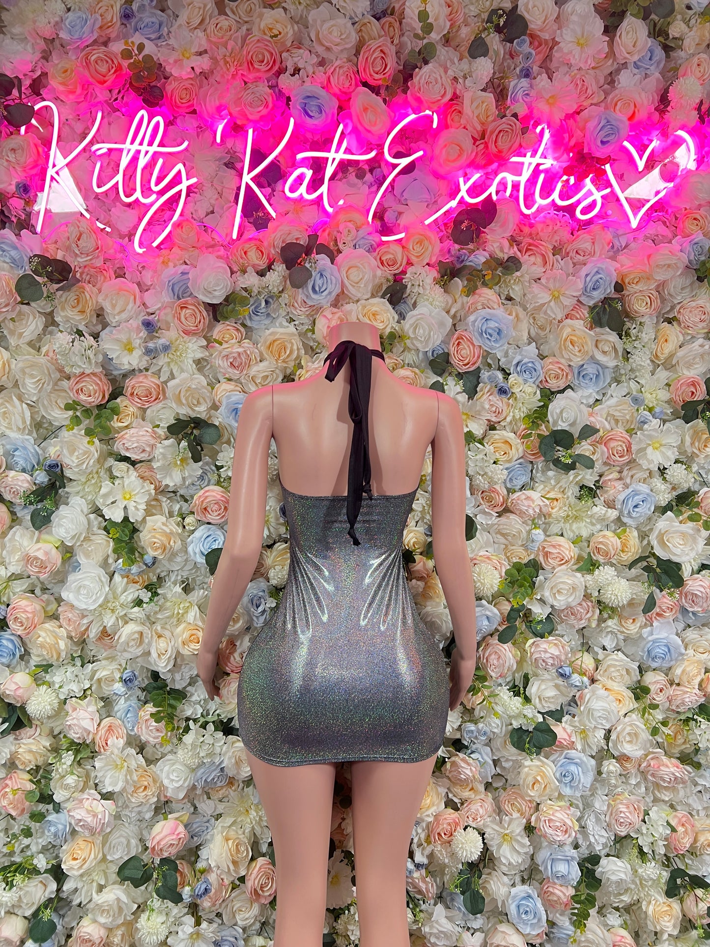 Silver metallic halter mini dress with open back and glitter finish