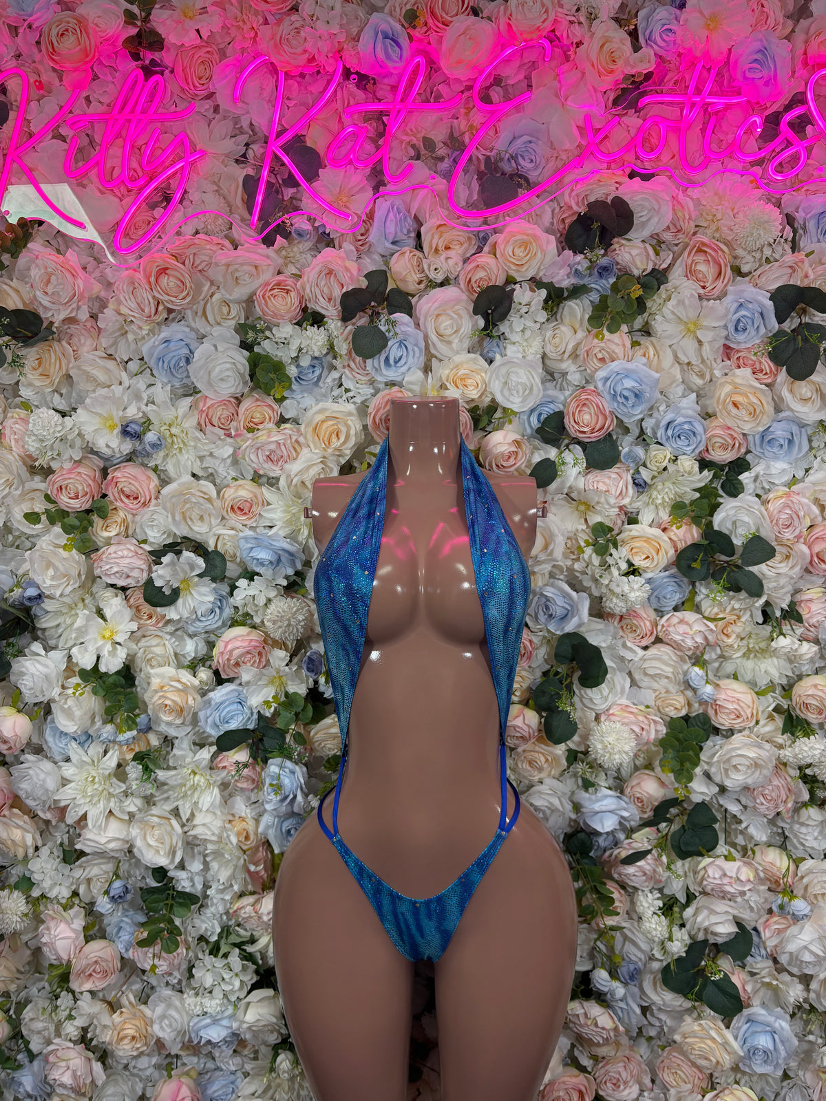 Blue metallic rhinestone slingshot bodysuit, plunging front with thin spaghetti straps