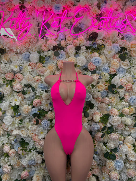 Hot pink sleeveless one-piece dancewear bodysuit with V-neck front and high-cut legs
