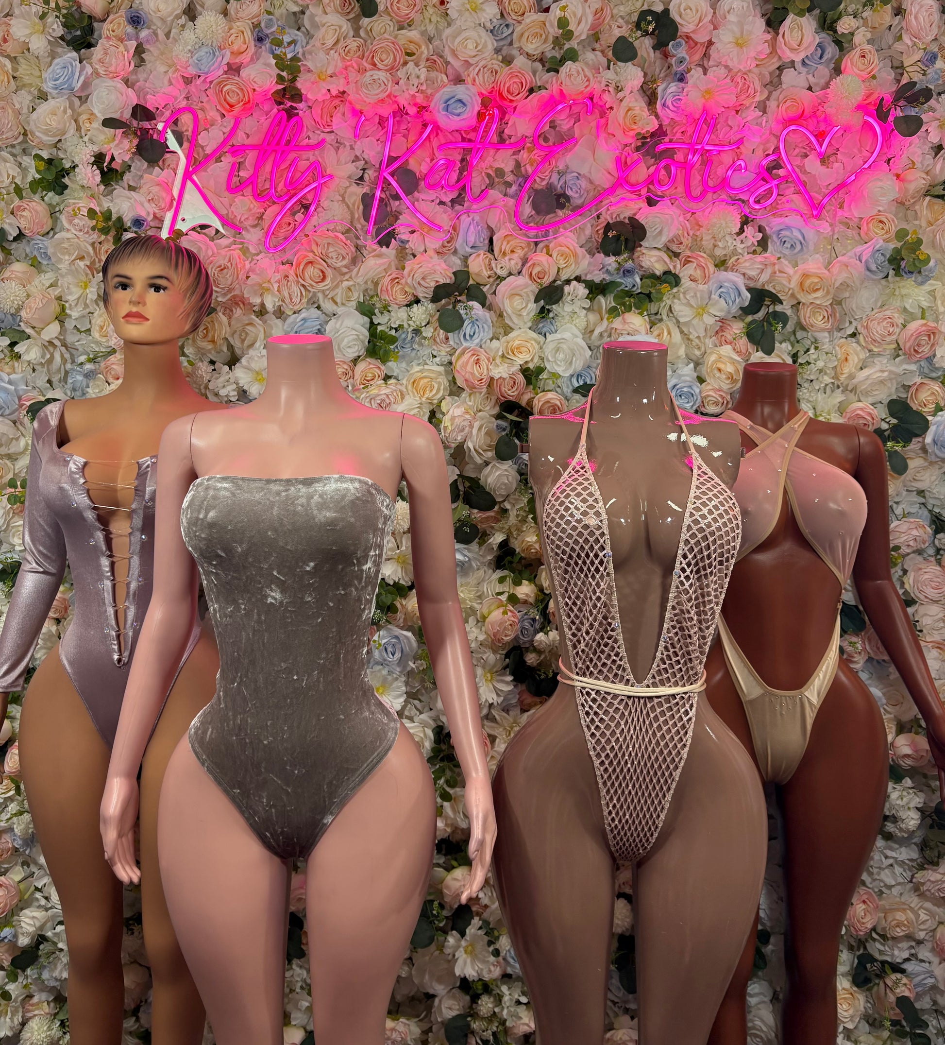 Silver-gray velvet bodysuit with strapless square neckline and high-cut legs.
