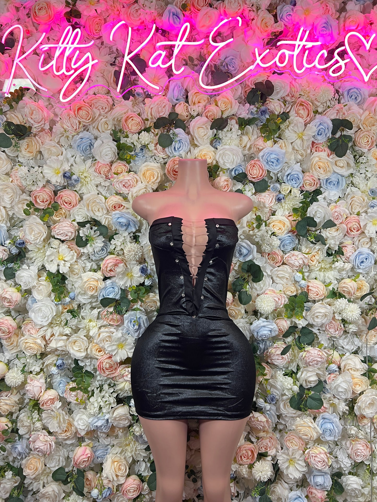 Black satin mini corset dress with sweetheart neckline and ruched bodice, front view