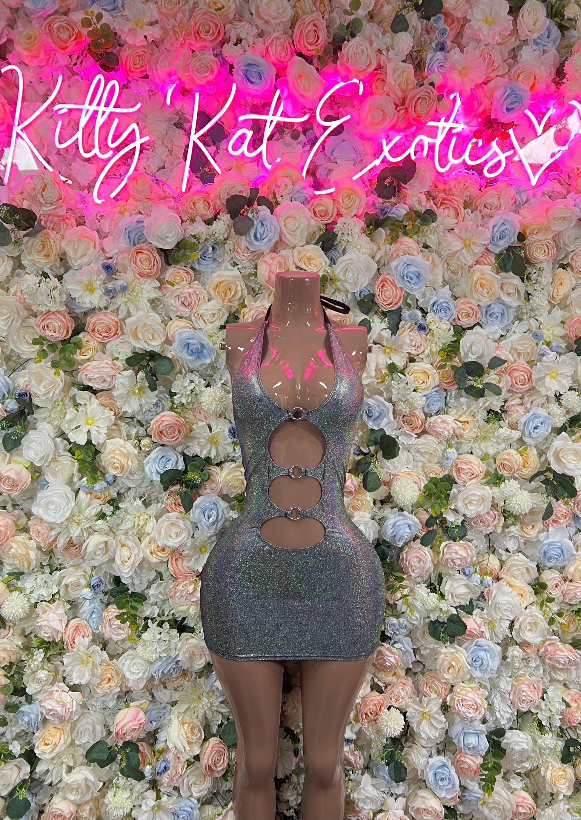 Silver metallic mini dress with halter neckline and circular cutout sides