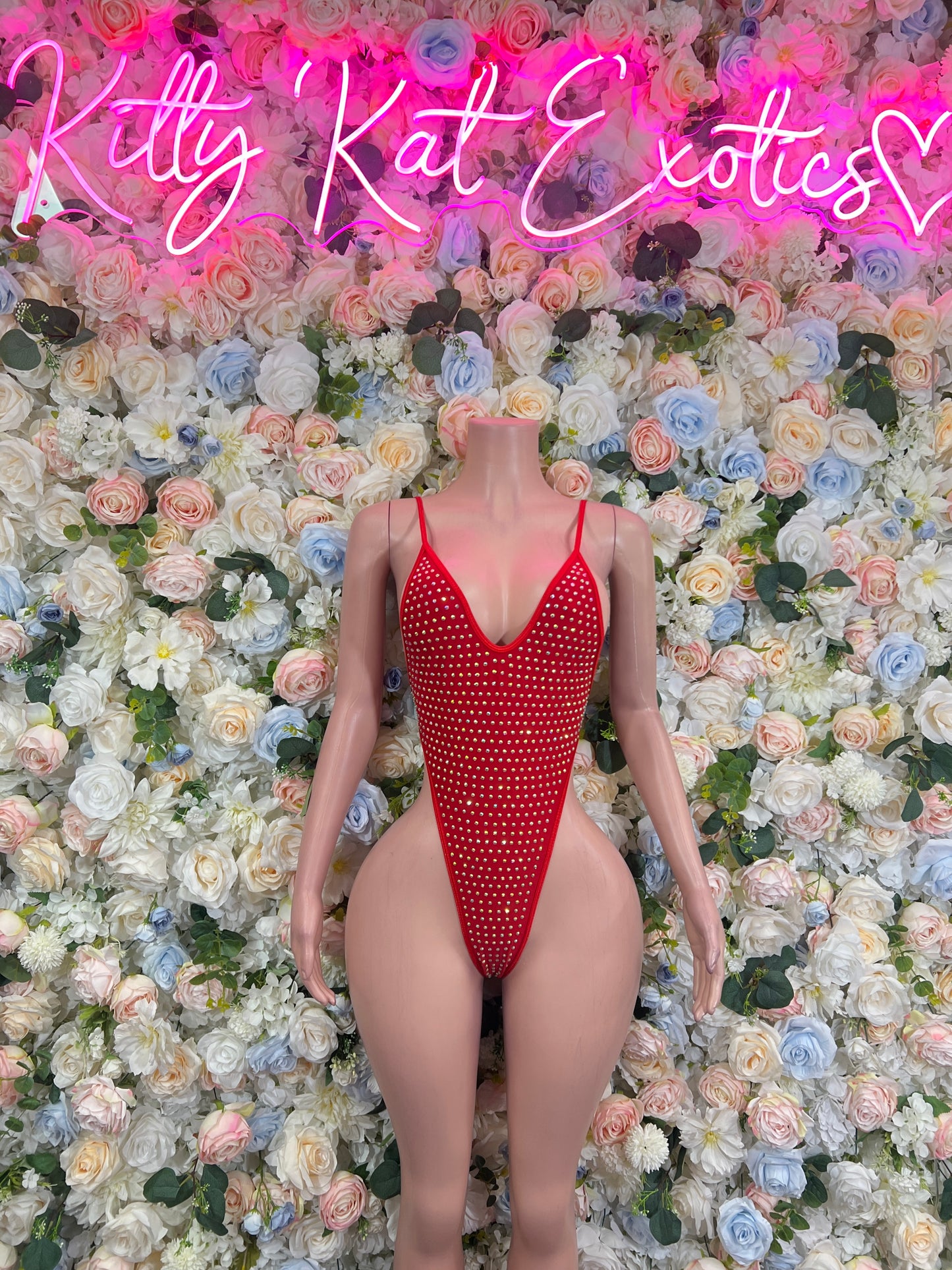 Red rhinestone bodysuit with V-neck and thong-cut backless one-piece