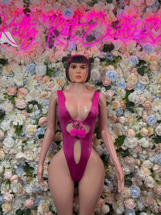 Pink one-piece bodysuit with deep V neckline and lace-up chest cutout