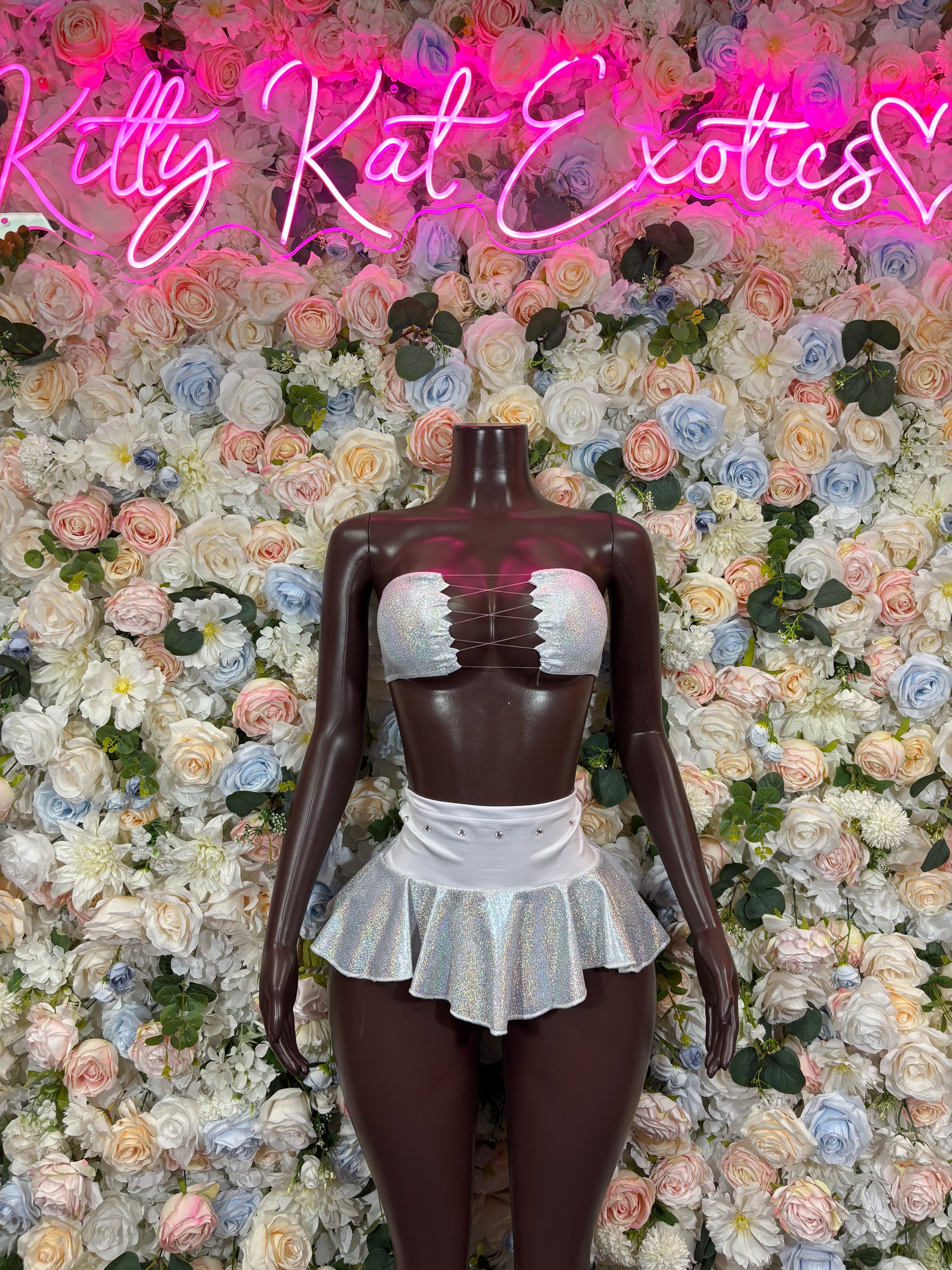 White metallic strapless crop top and tiered ruffle mini skirt two-piece outfit