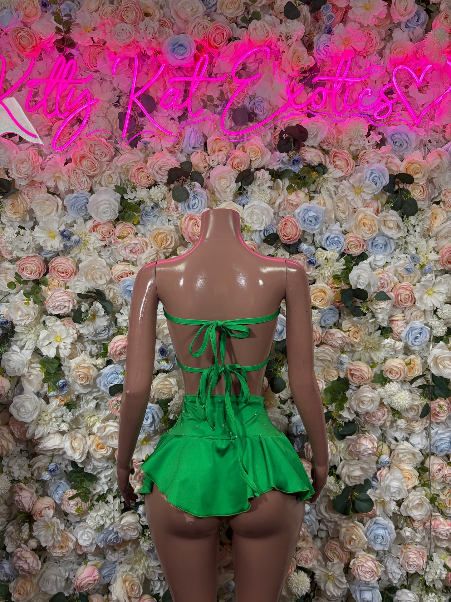 Green skirt set, open-back bandeau top and ruffled mini skirt