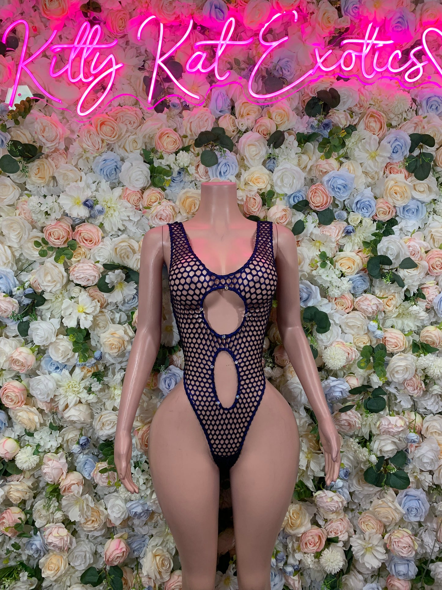 Navy fishnet one-piece with front oval cutout, vertical waist slit, high-cut leg