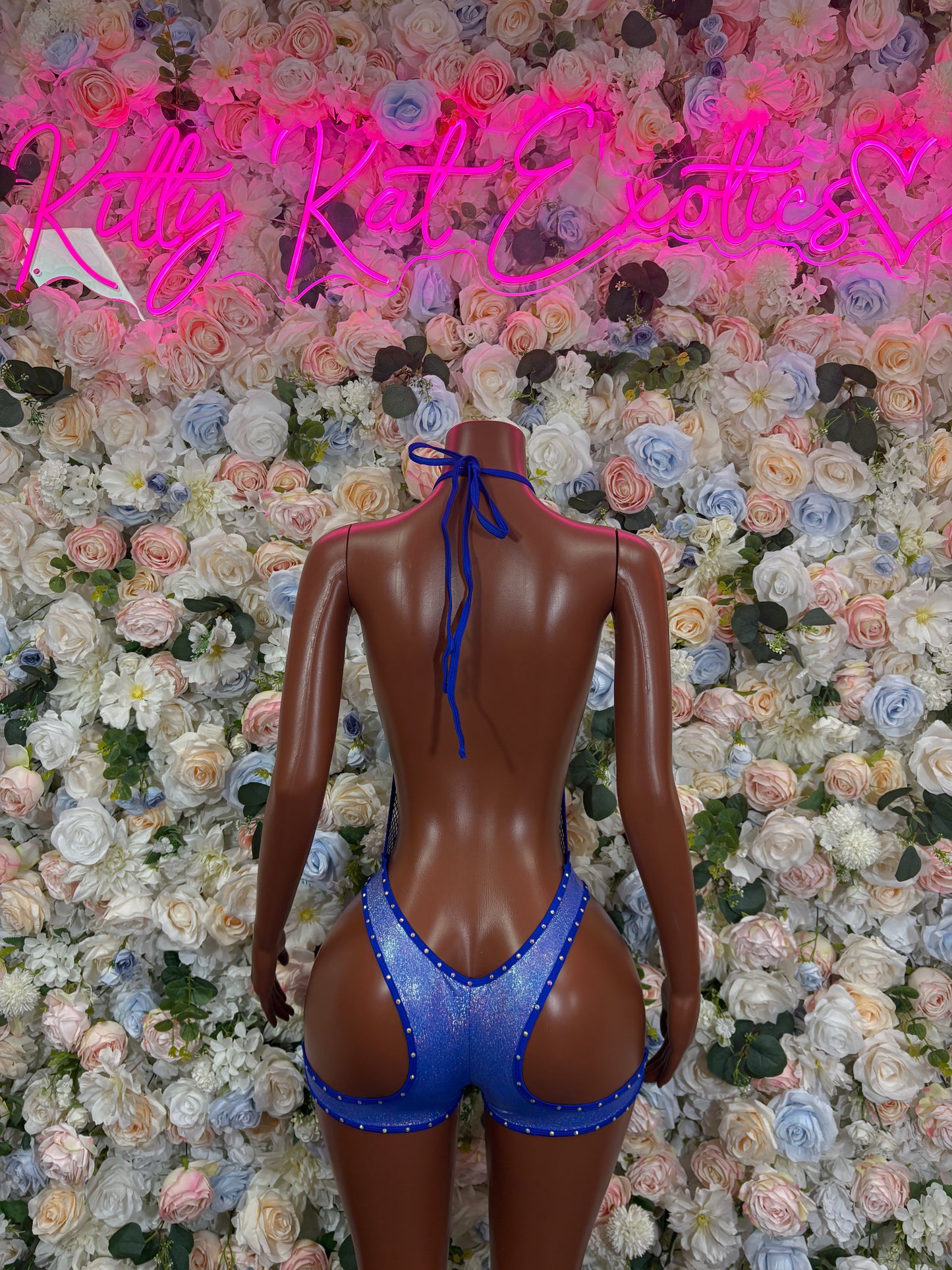 Blue rhinestone fishnet bodysuit back with crisscross straps and thong cut