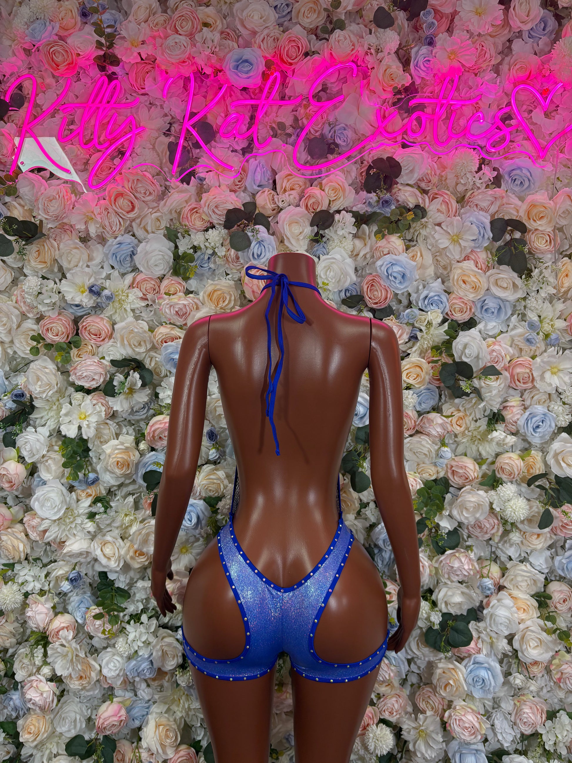 Blue rhinestone fishnet bodysuit back with crisscross straps and thong cut