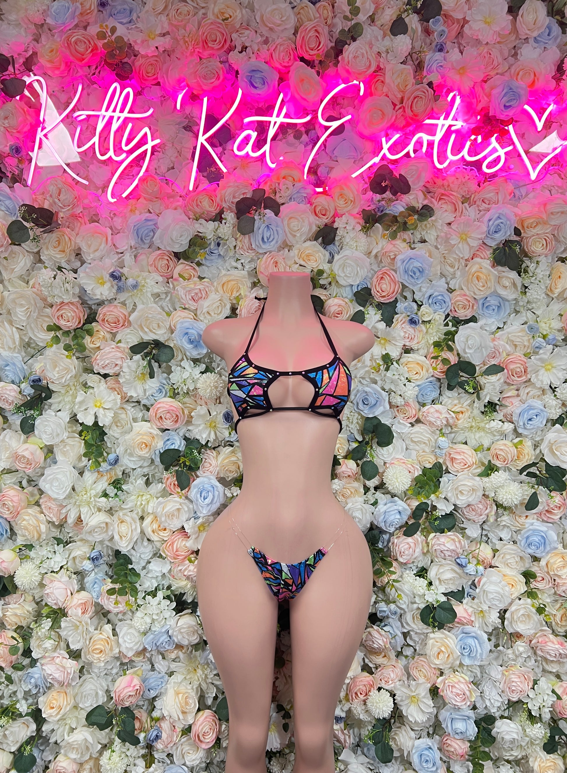 Multicolor strappy bikini lingerie set with triangle bra and matching briefs