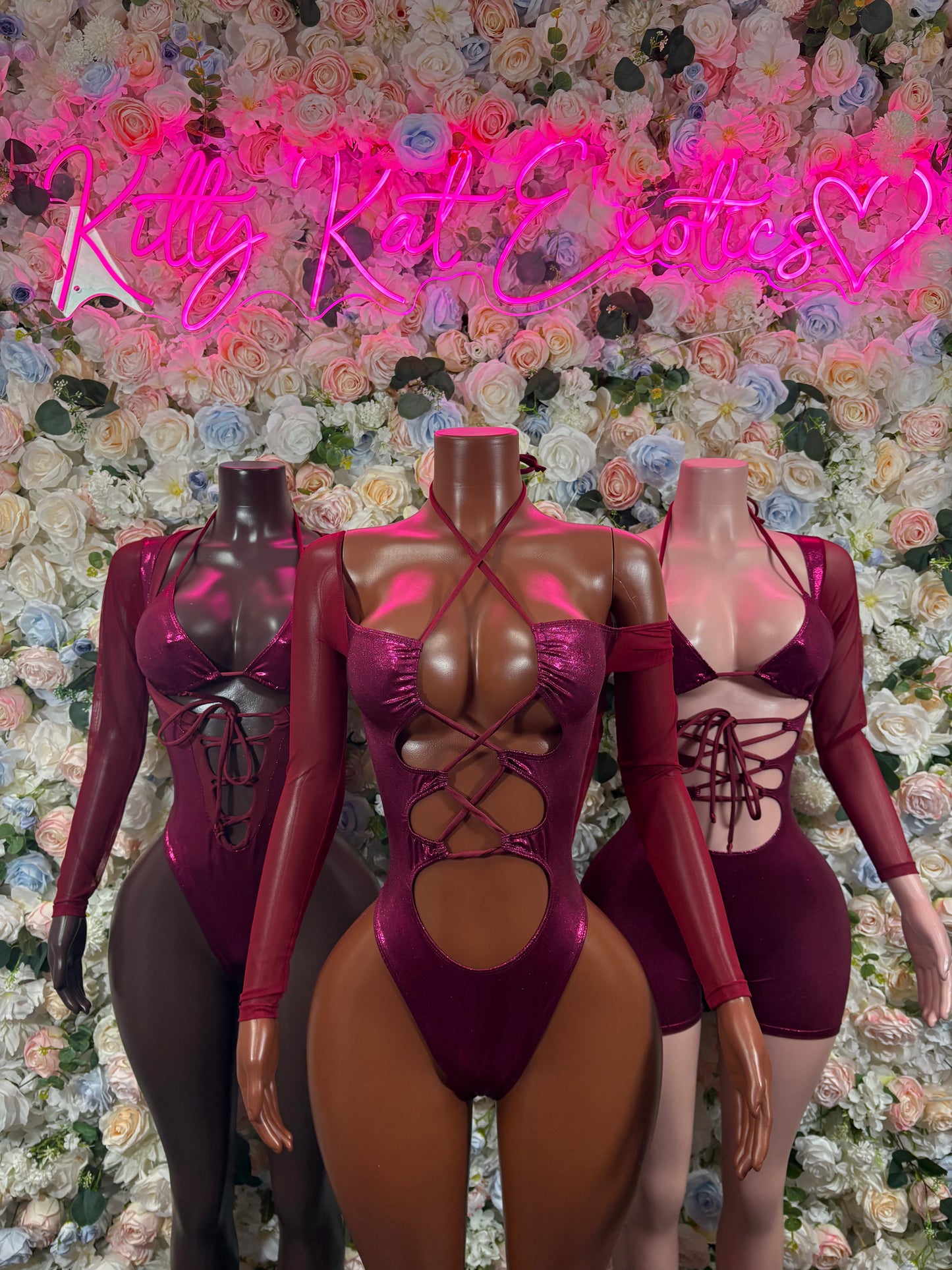 Set of burgundy long-sleeve one-piece bodysuits with lace-up cutouts