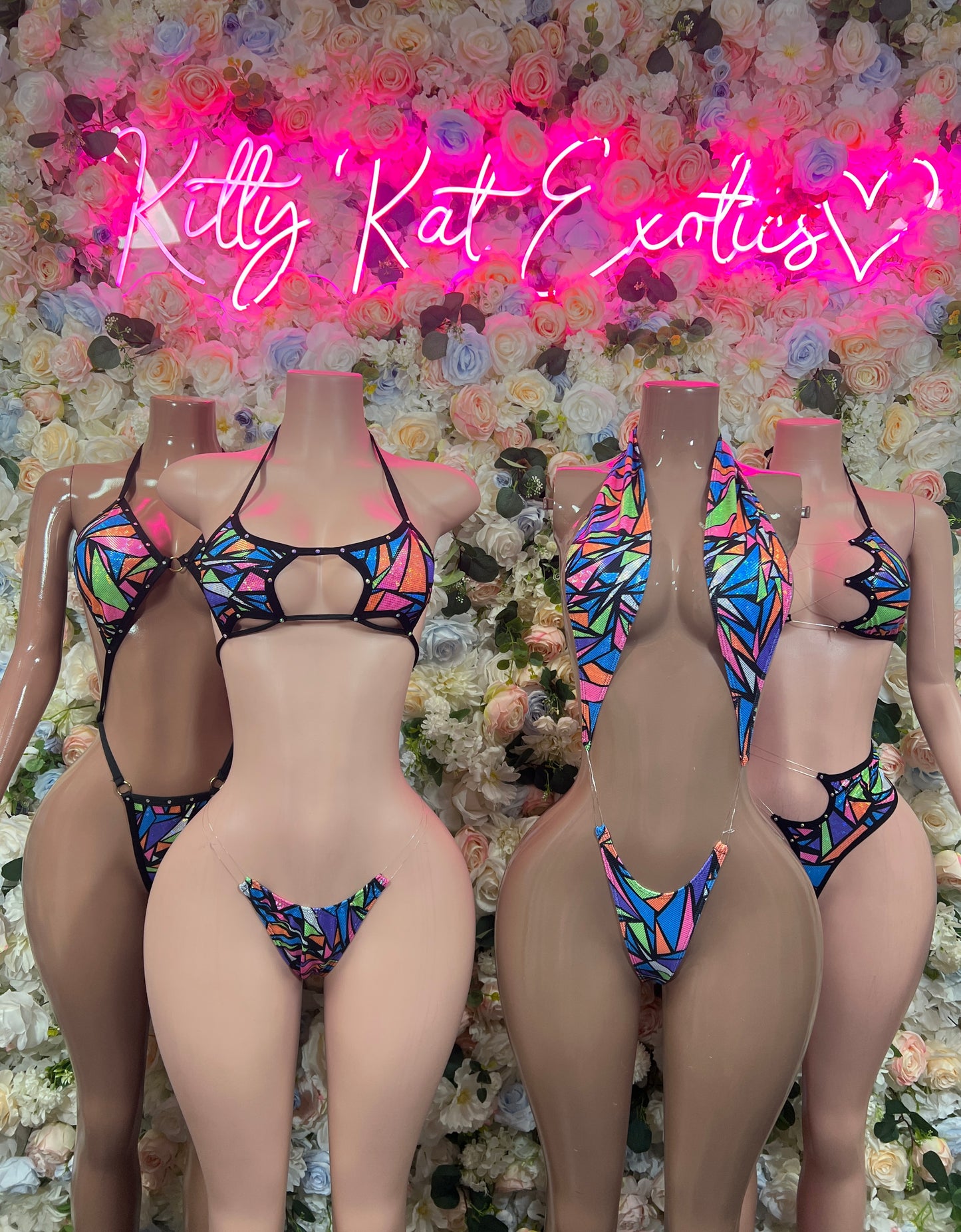 Multicolor strappy bikini lingerie set on multiple mannequins, triangle tops and briefs