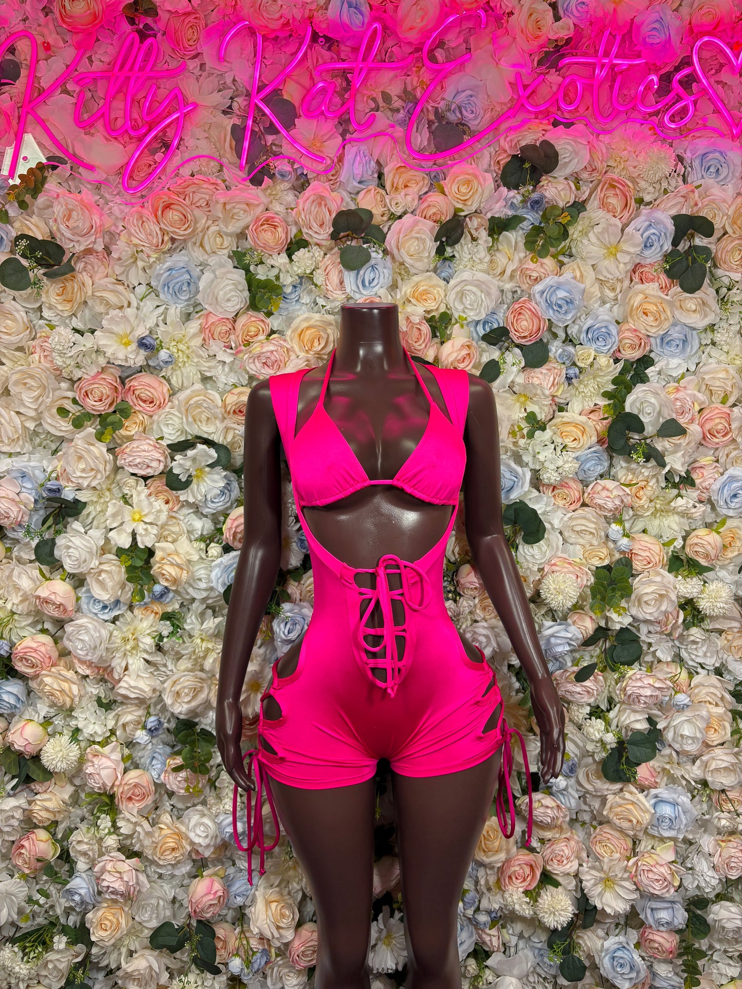 Pink plunging neckline lace-up bodysuit with tie-front and side tassels