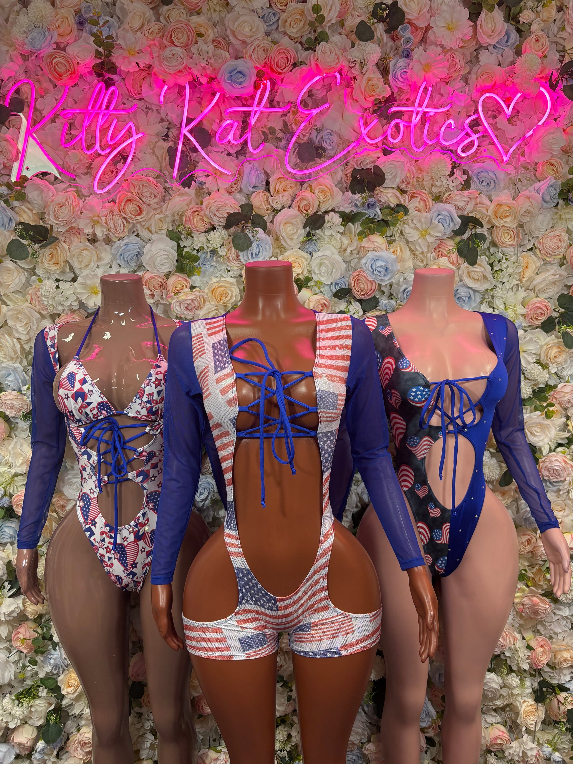 Patriotic bodysuit with lace-up back, long sleeves, and star-striped swimsuit bottoms