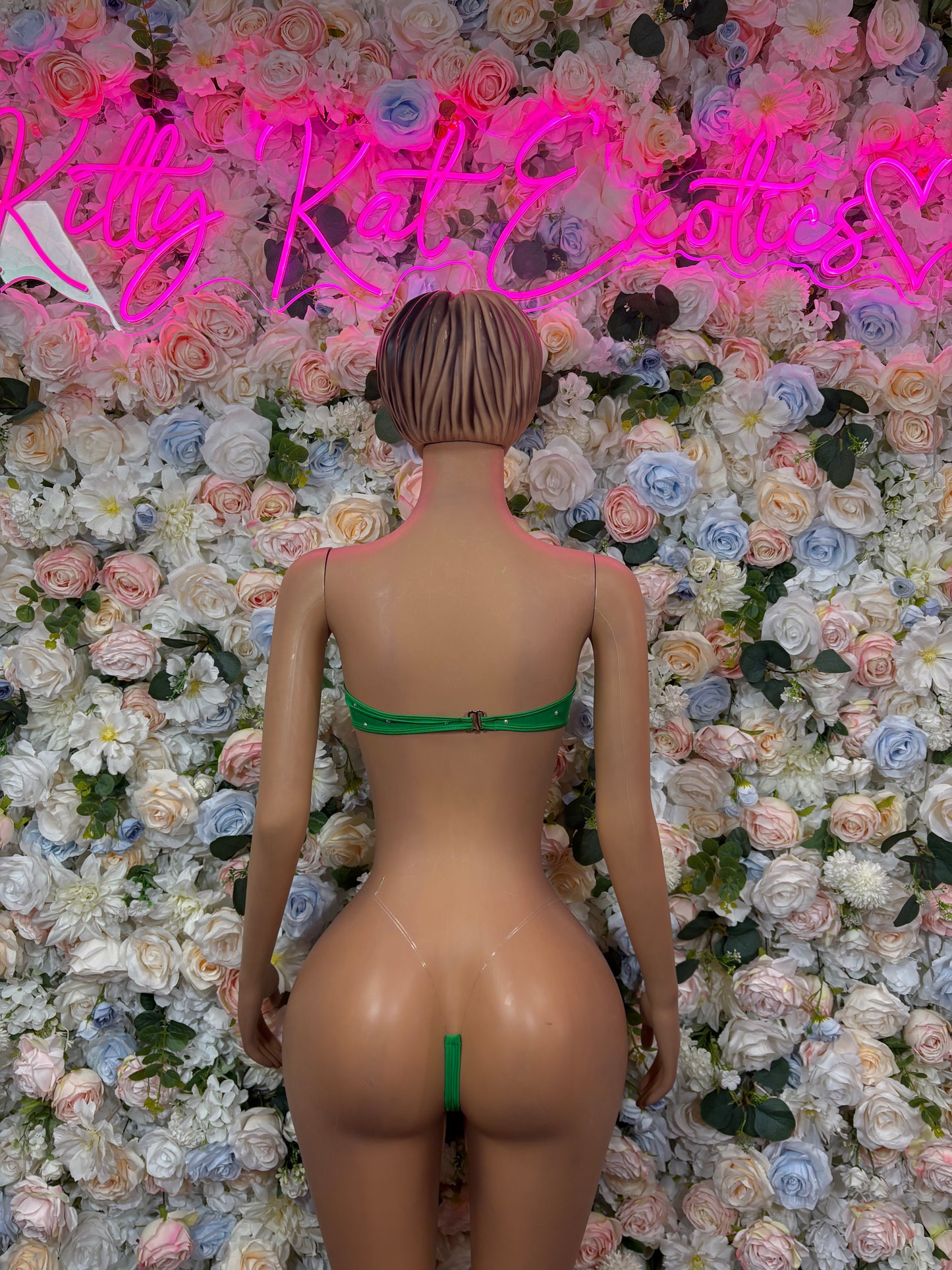 Green bikini set back view with lace-up ties and matching cheeky bottoms