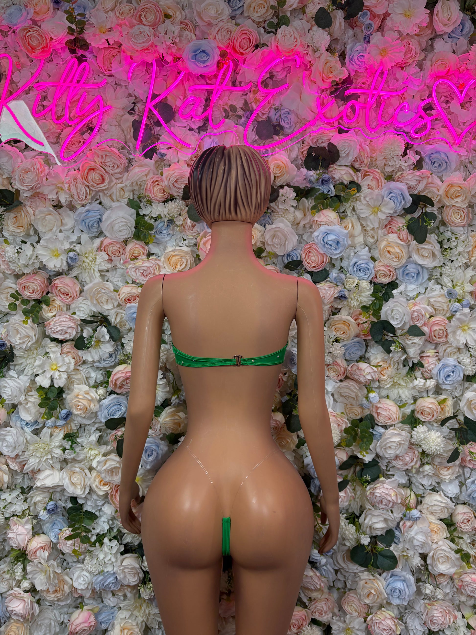 Green bikini set back view with lace-up ties and matching cheeky bottoms