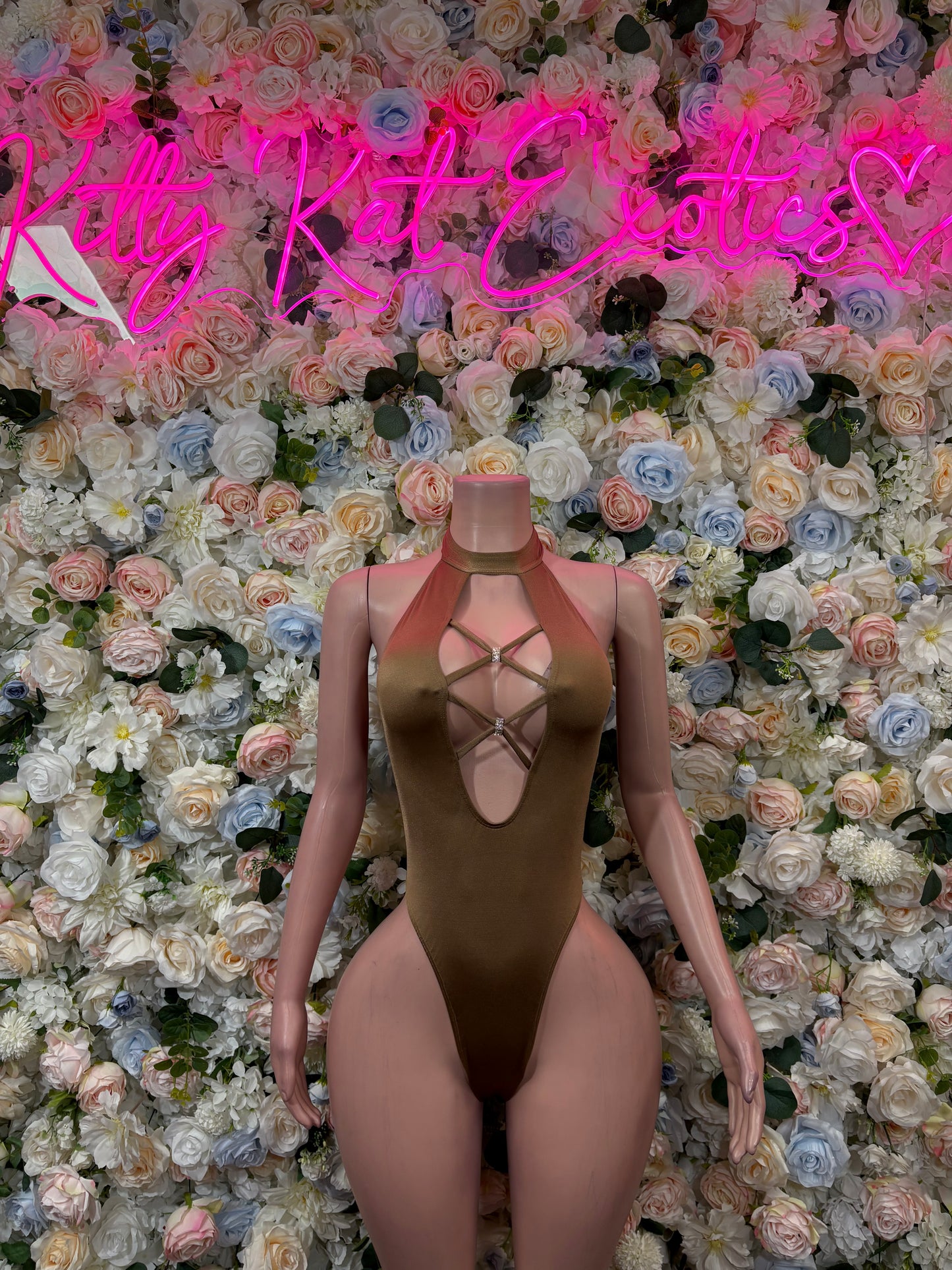 Tan lace-up bodysuit with halter neckline and thong back