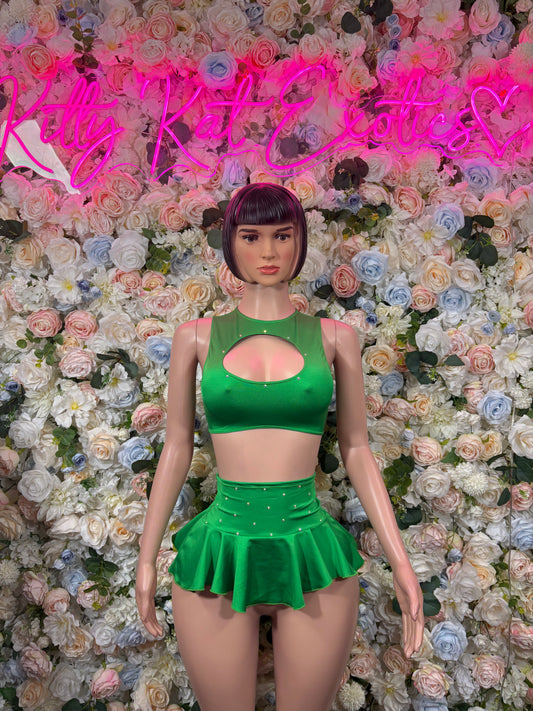 Green two-piece skirt set with cutout halter crop top and flared mini skirt, front view